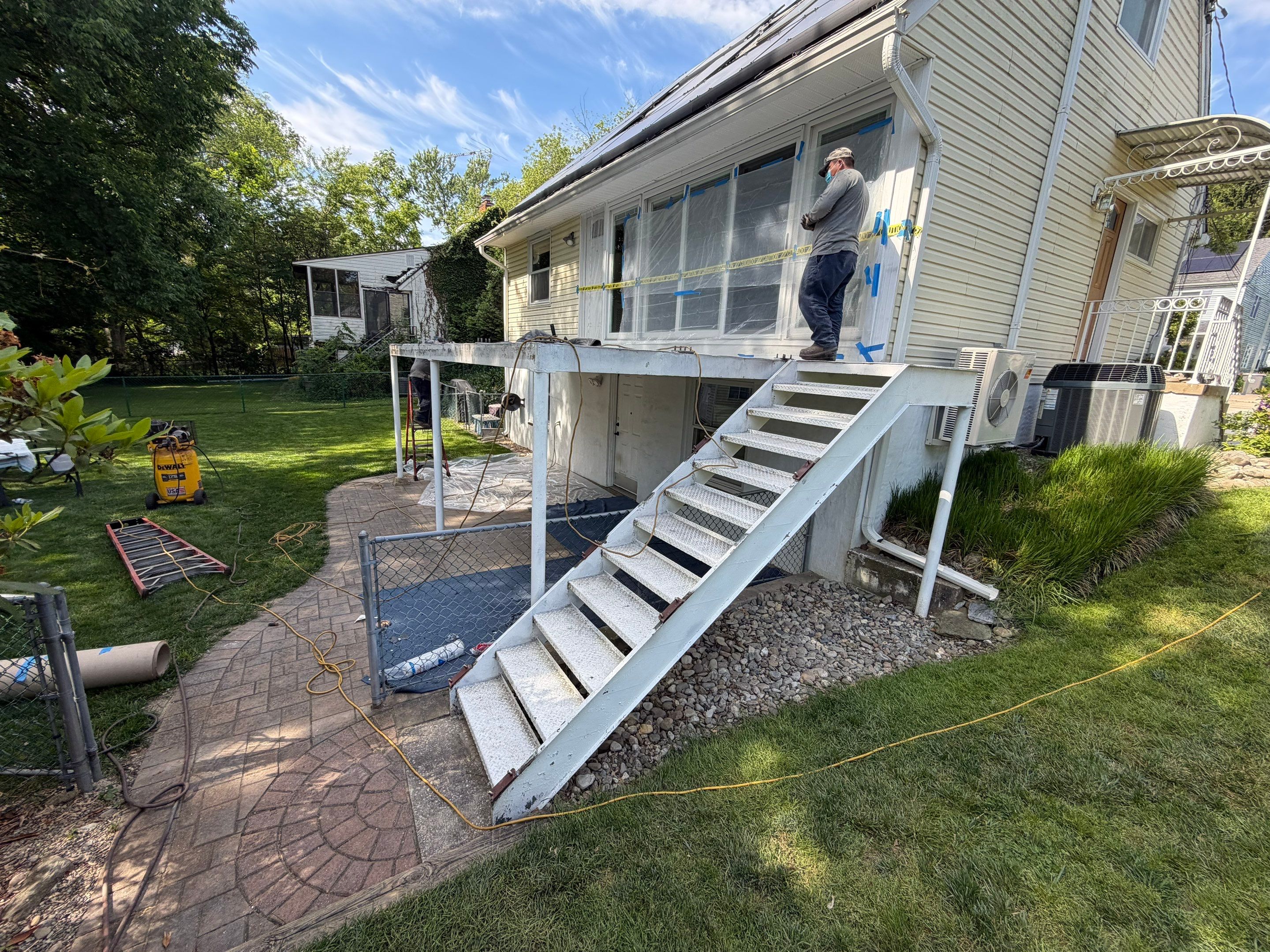 White Powder-Coated Outdoor Railings in Rockville & Staircase and Deck Refurbishment  by Capitol Iron Works