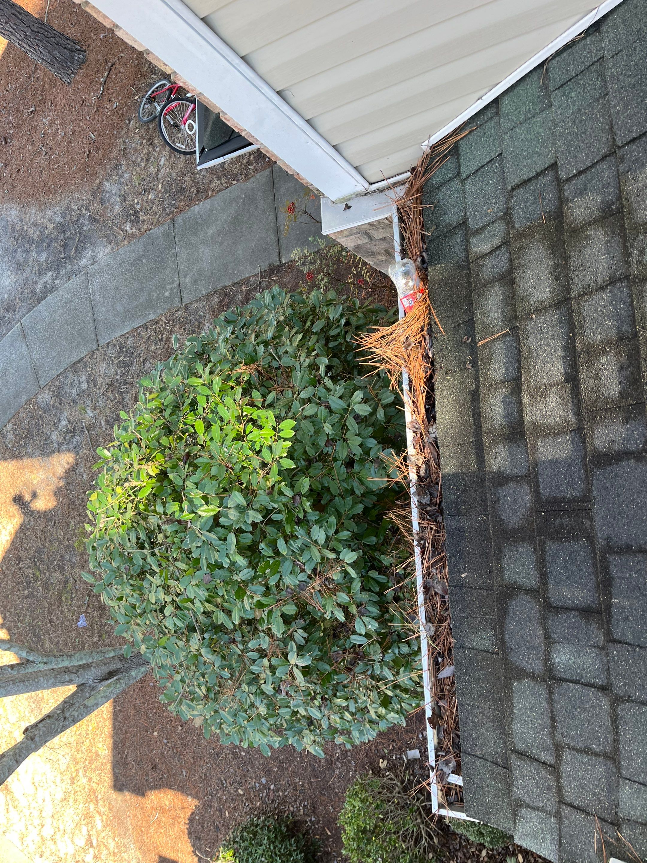 Commercial gutter cleaning Pinehurst & Southern Pines, NC before photo with filled gutters