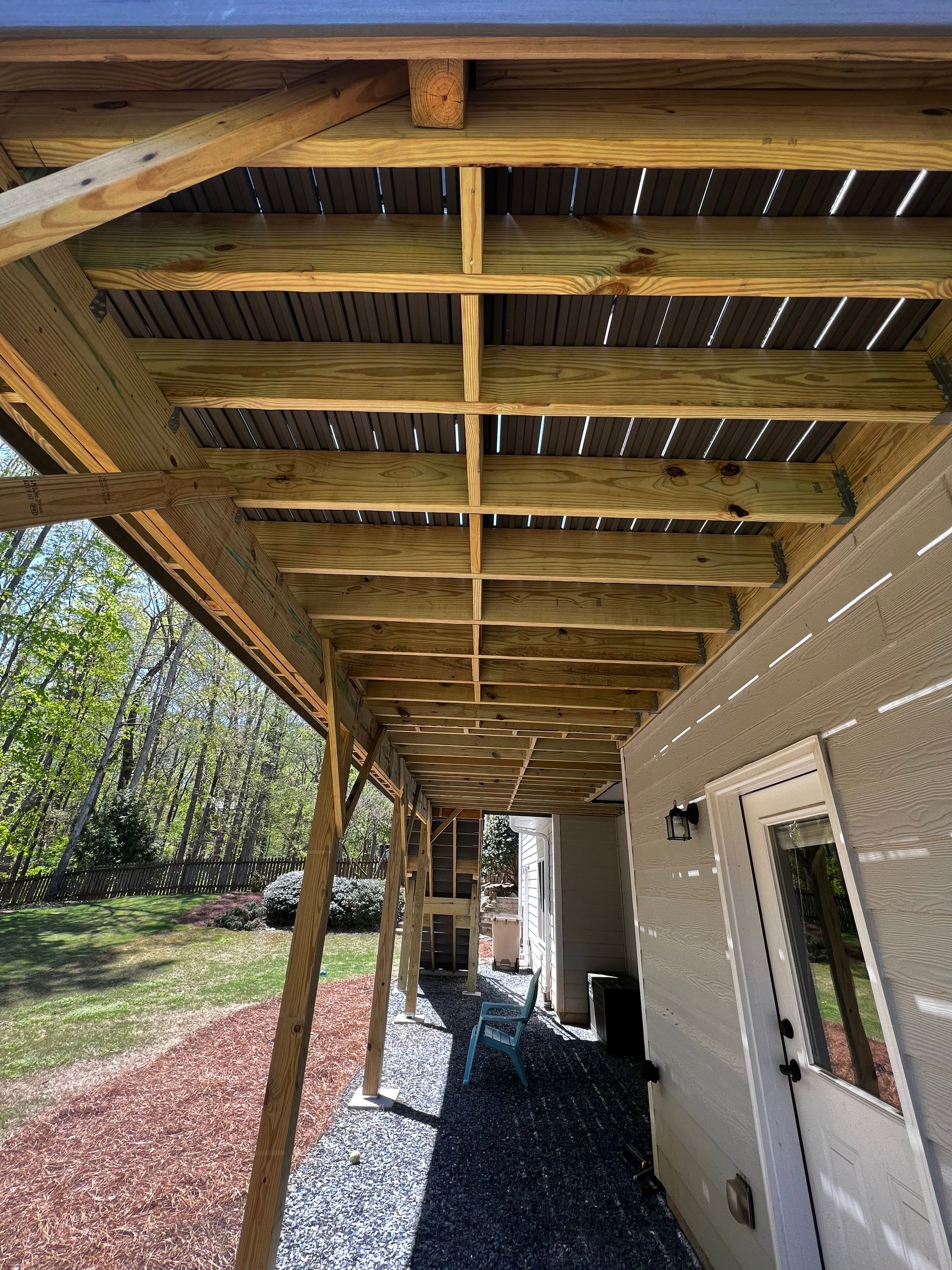 Elevated Grey Composite Deck Installation in Woodstock by Swift Home Renovations 