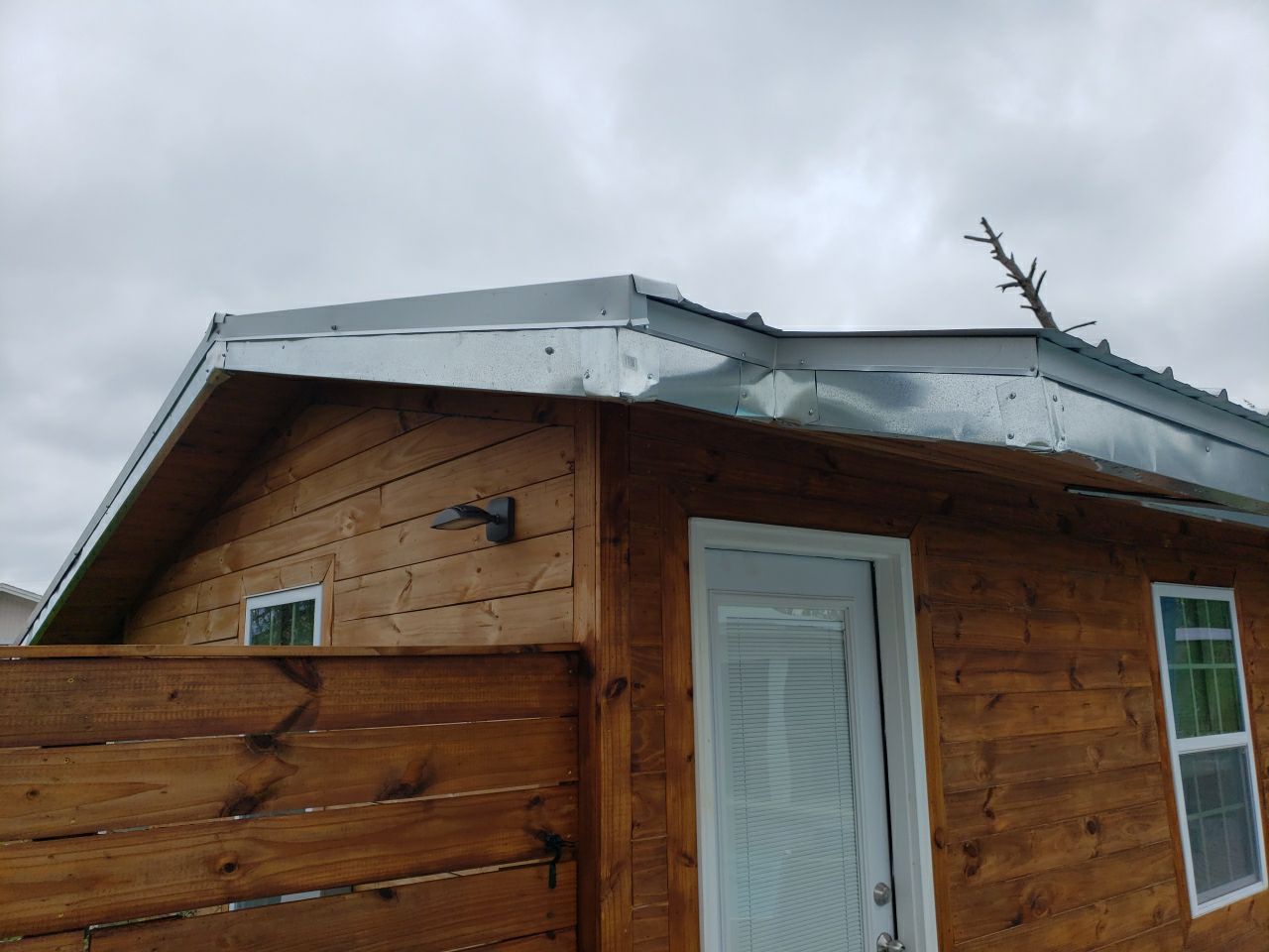 Gutter Installation using K-Style Seamless Gutters and Soffit and Fascia Replacement by Gutter Professors