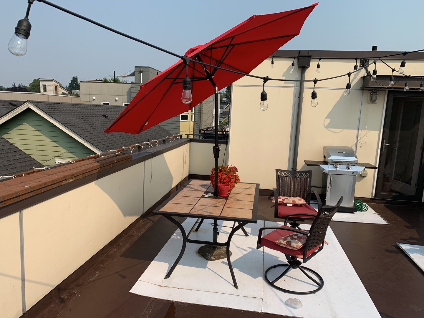 Ballard Rooftop Deck using IPE Tiles by Alki deck builders