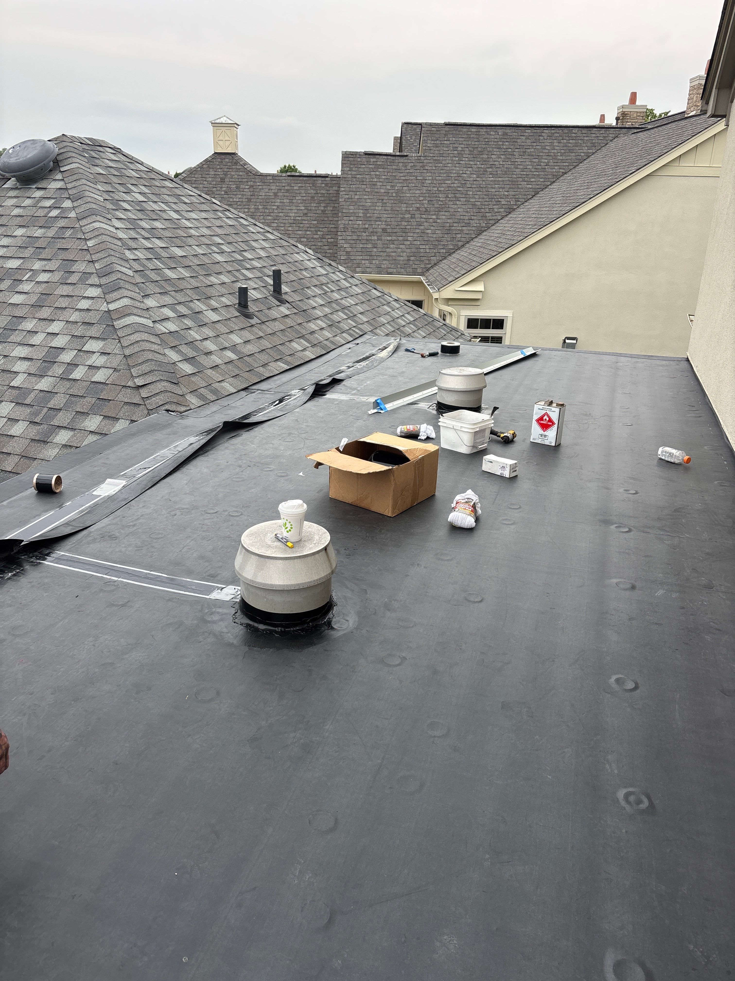 Rubber Roof Repair by KFX Roofing