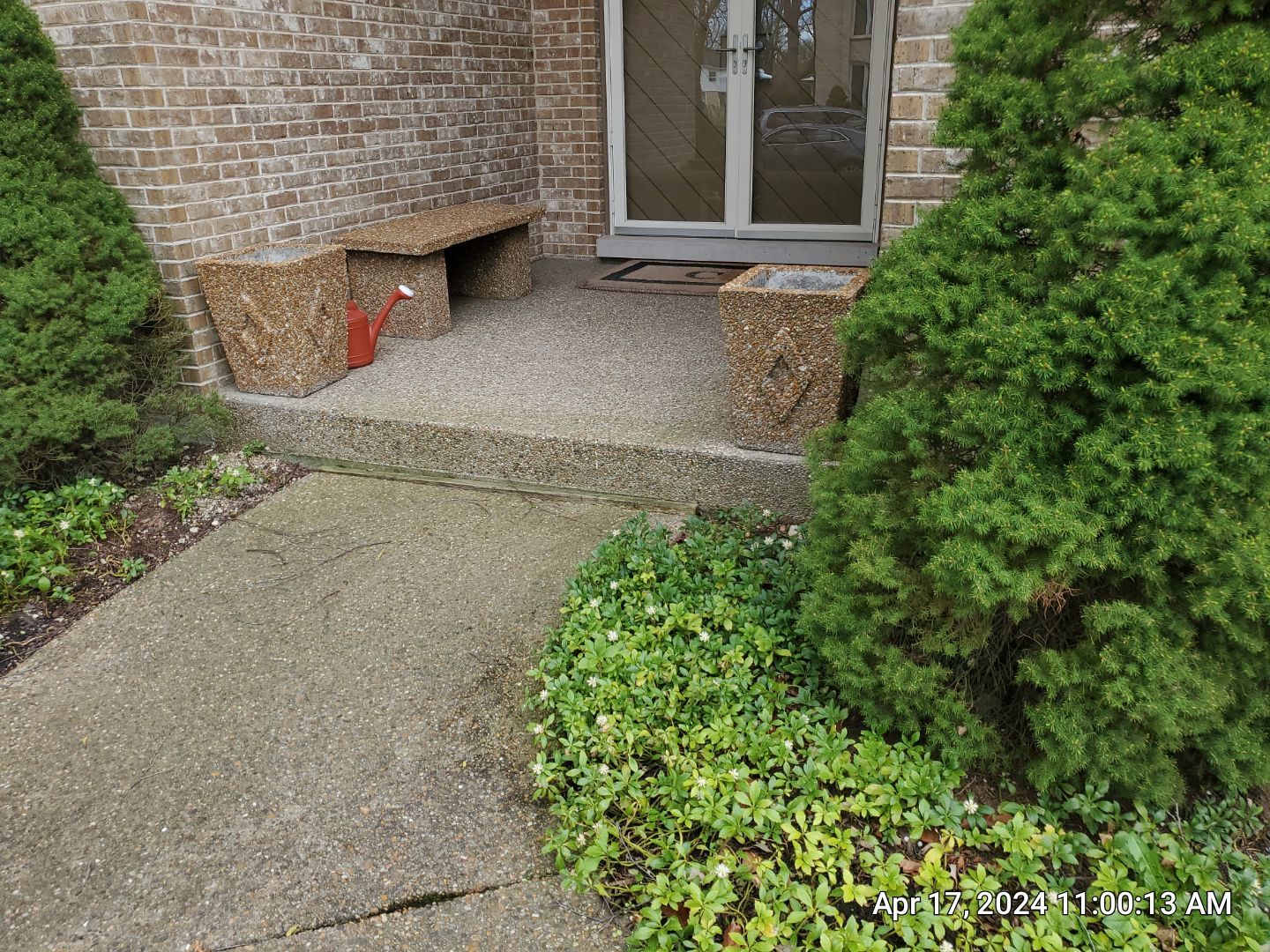 concrete patio and driveway cleaning by Northern Power Washing LLC.