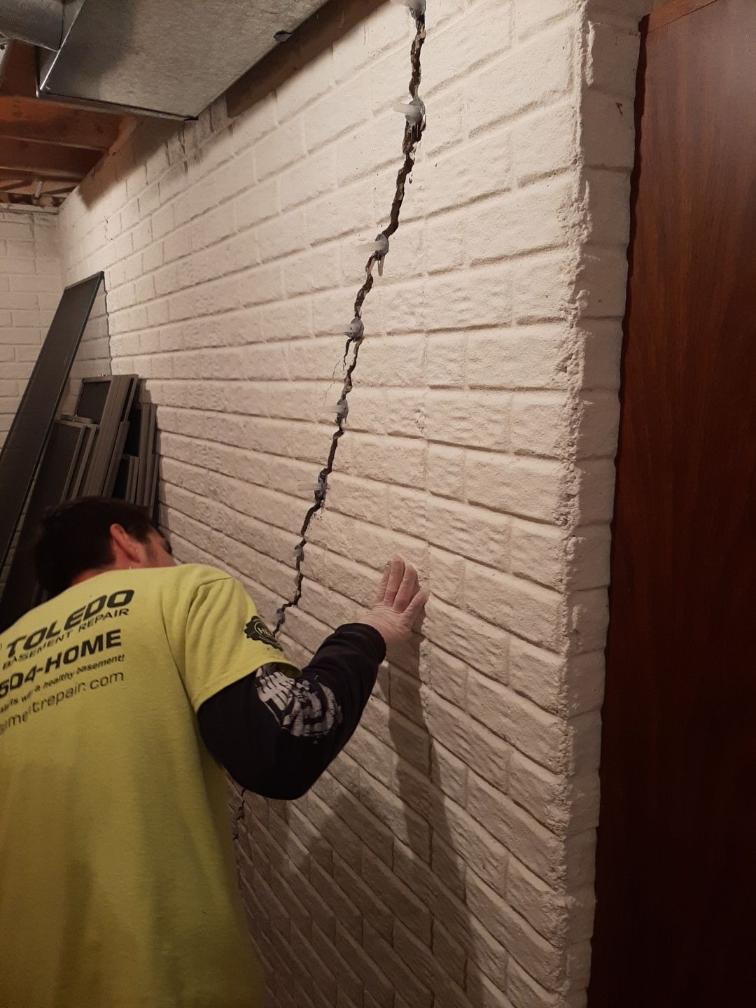 Helical Piers and Wall Crack Injections by Toledo Basement Repair