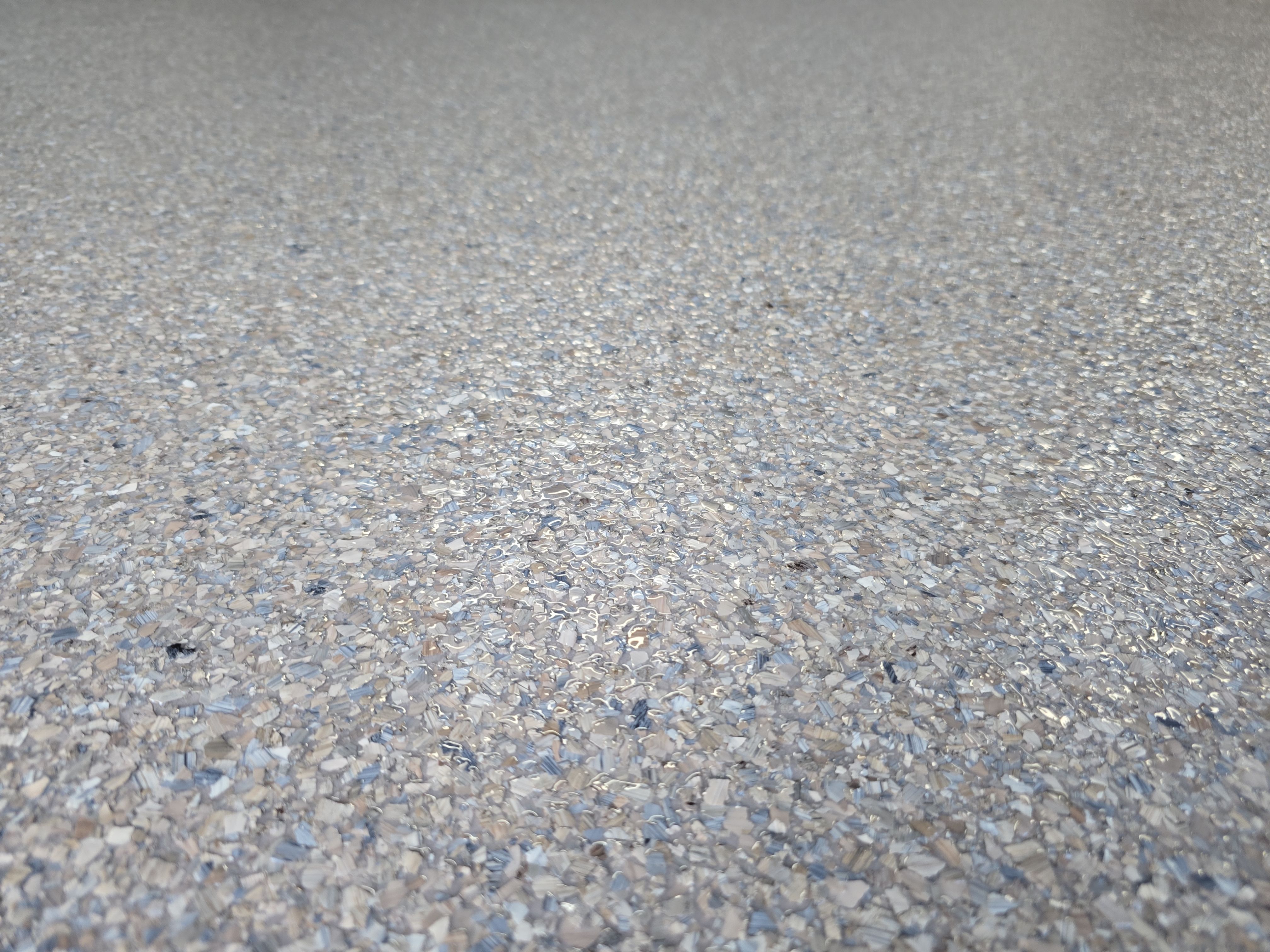 Driveway & Garage Using Obsidian by Elite Floor Solutions