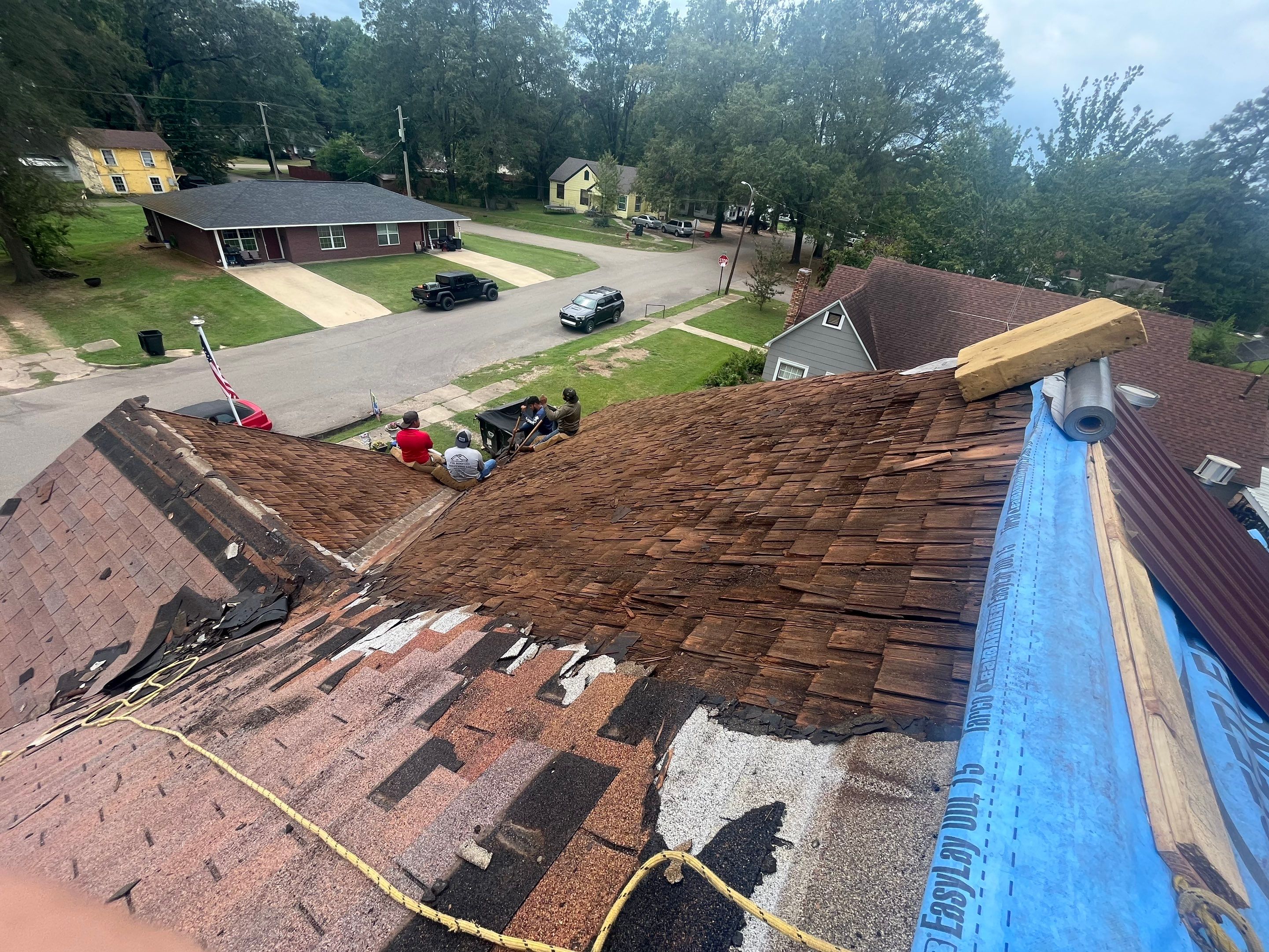 Residential Metal Roof Replacement using Reed's Metals: Colored Residental Panel (Burgundy) by Hostetler Roofing