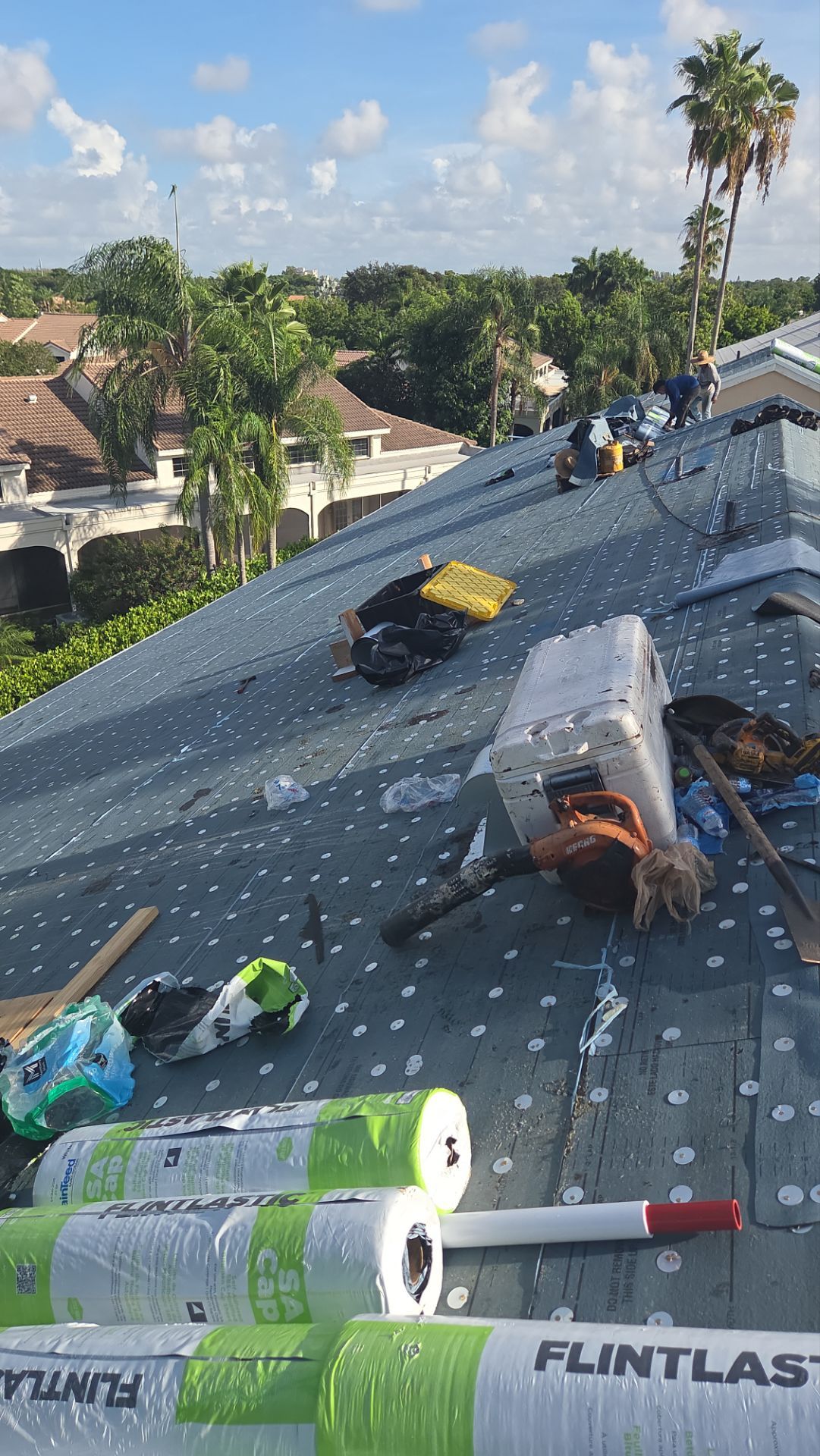 Comprehensive Tile Roof Replacement and Concrete Paver Driveway in Boca Raton by Aastro Roofing