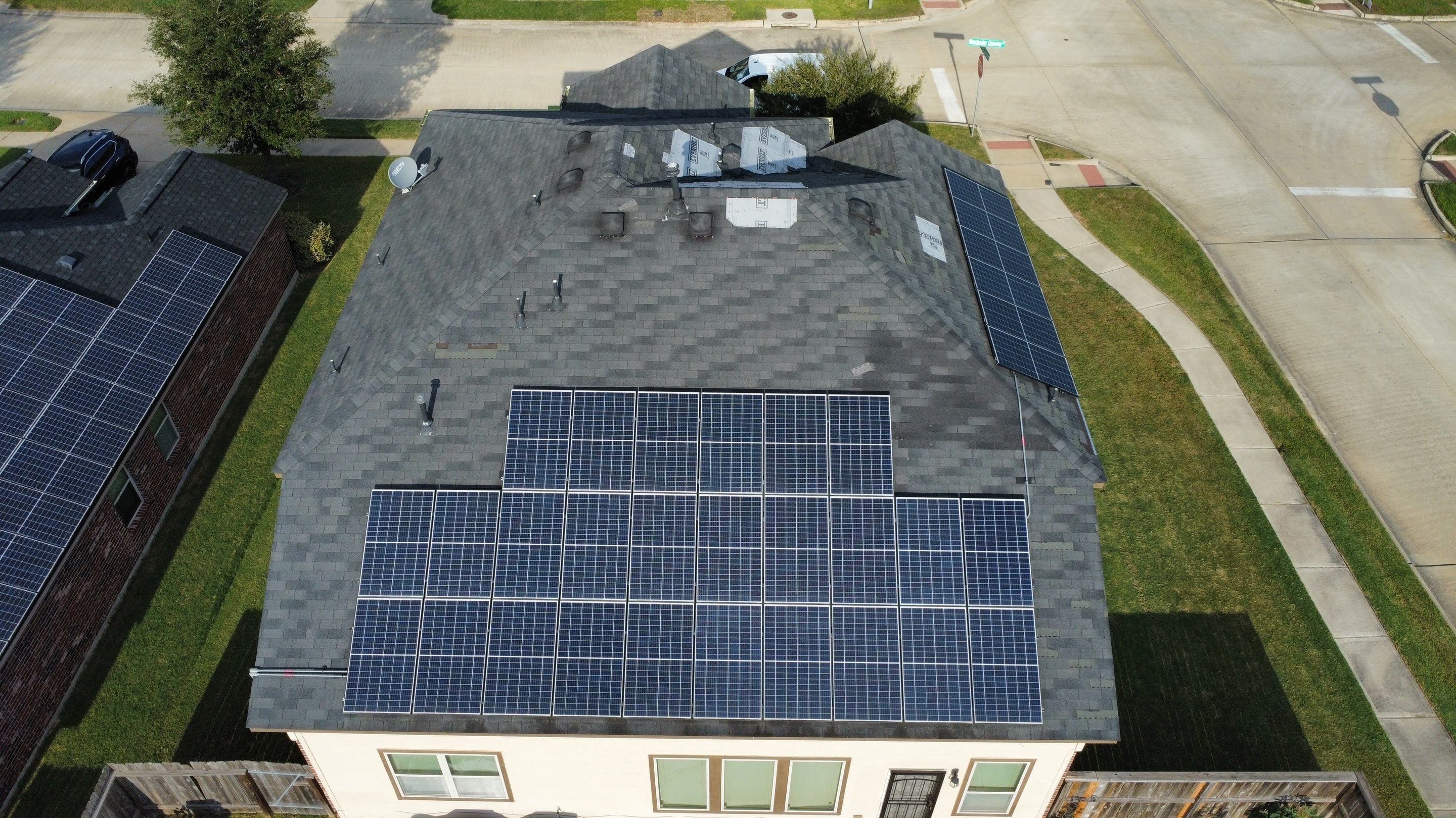 Reroof with Solar panel Detach and Reset by Berry Good Roofing 