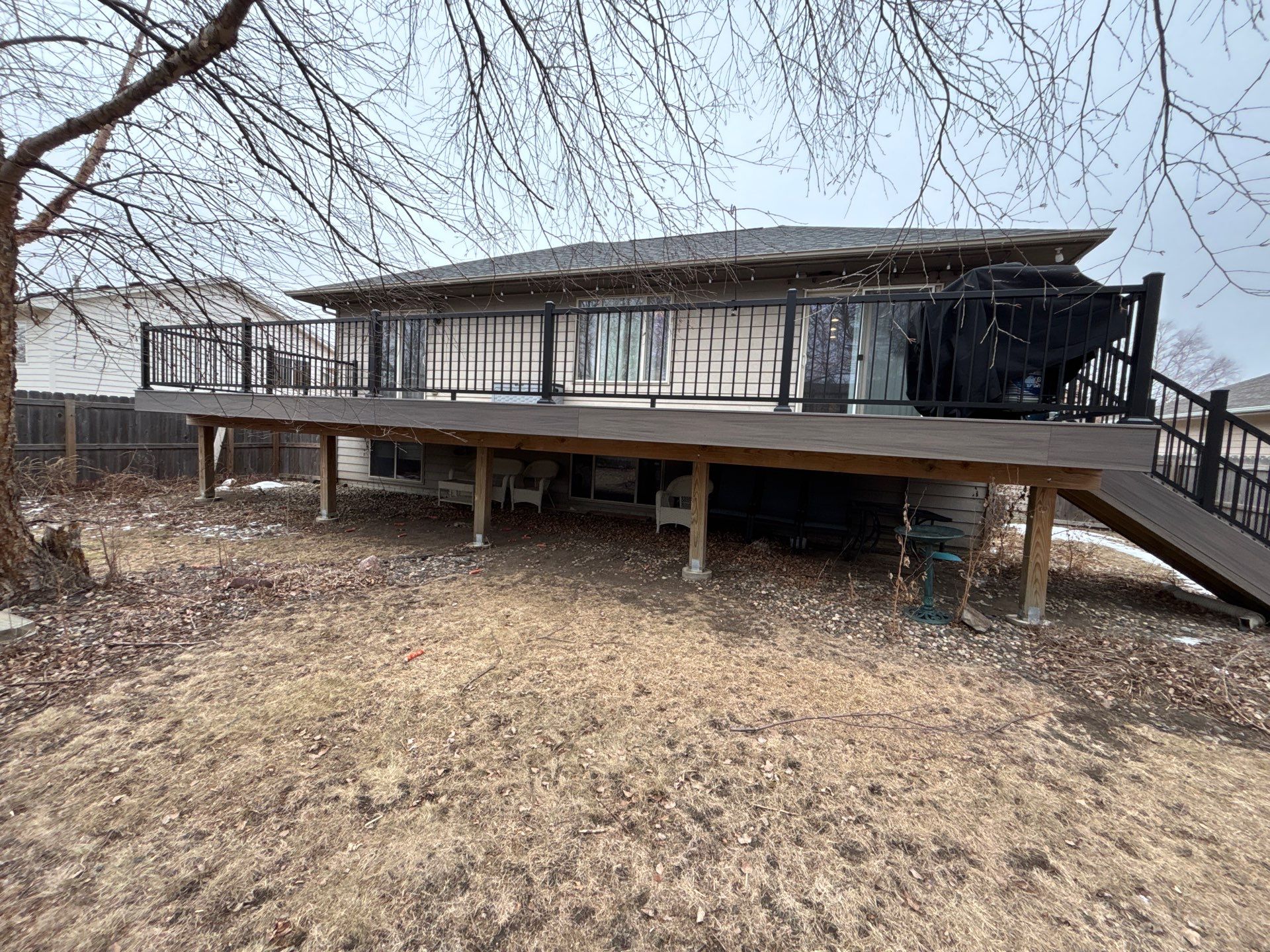 Exterior Painting and Wood Trim Replacement in Sioux Falls by Select Painting, Coatings & Garage Cabinets