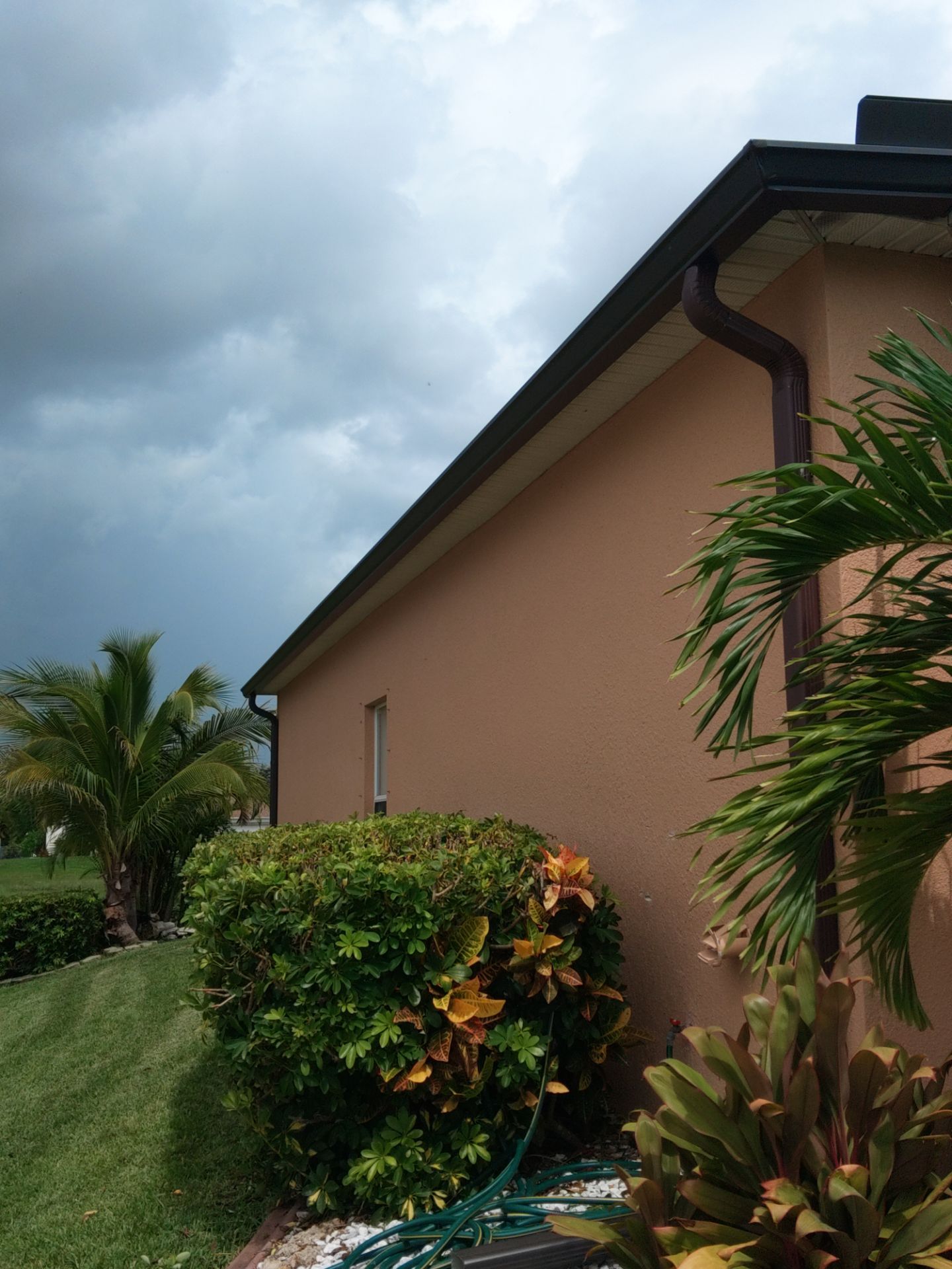 Downspout Installation for Multi-Story Homes in Cape Coral FL by Gutter Professors