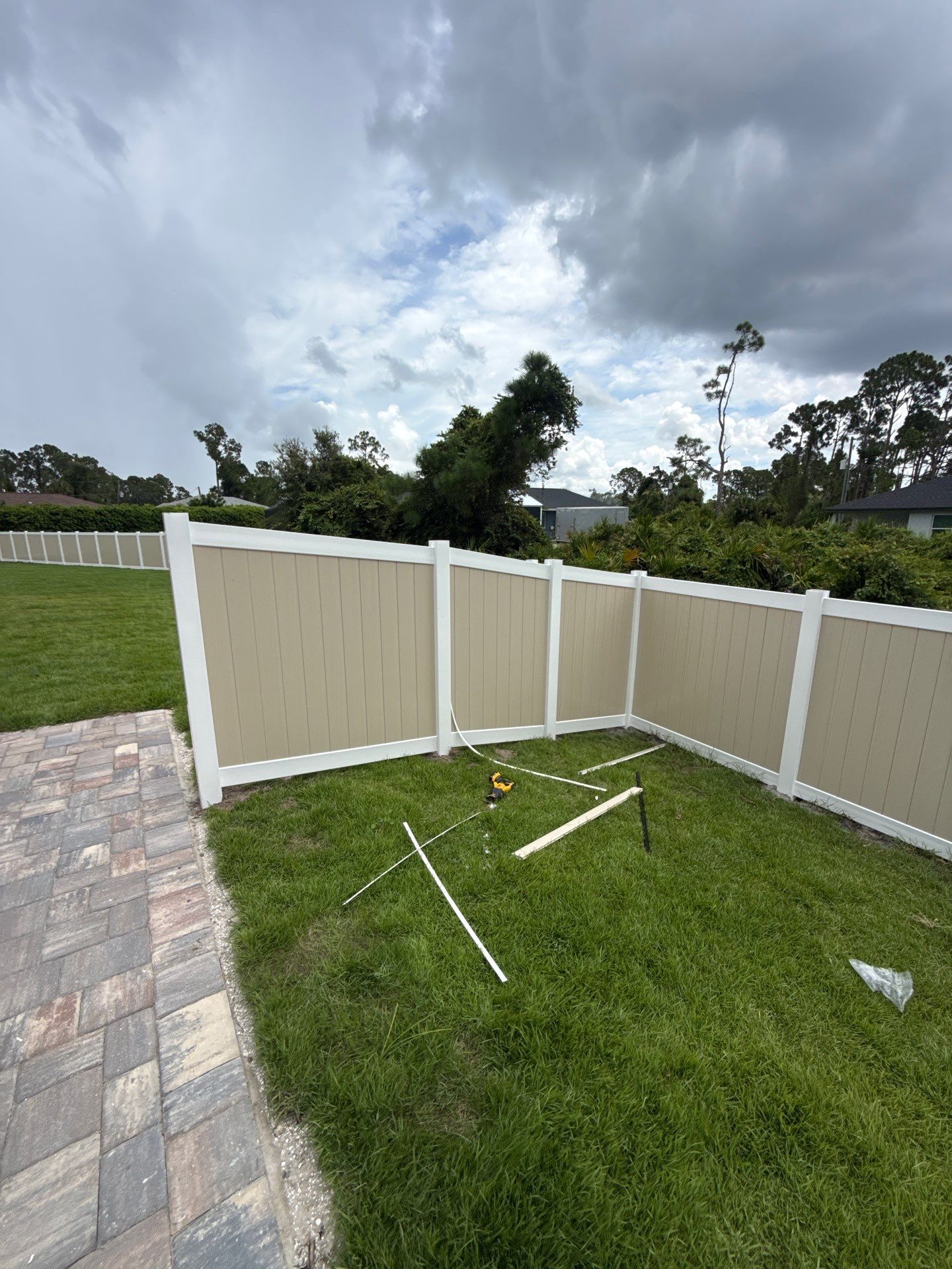 Custom Two-Tone Vinyl Privacy Fence Installation in North Port by True Fence LLC