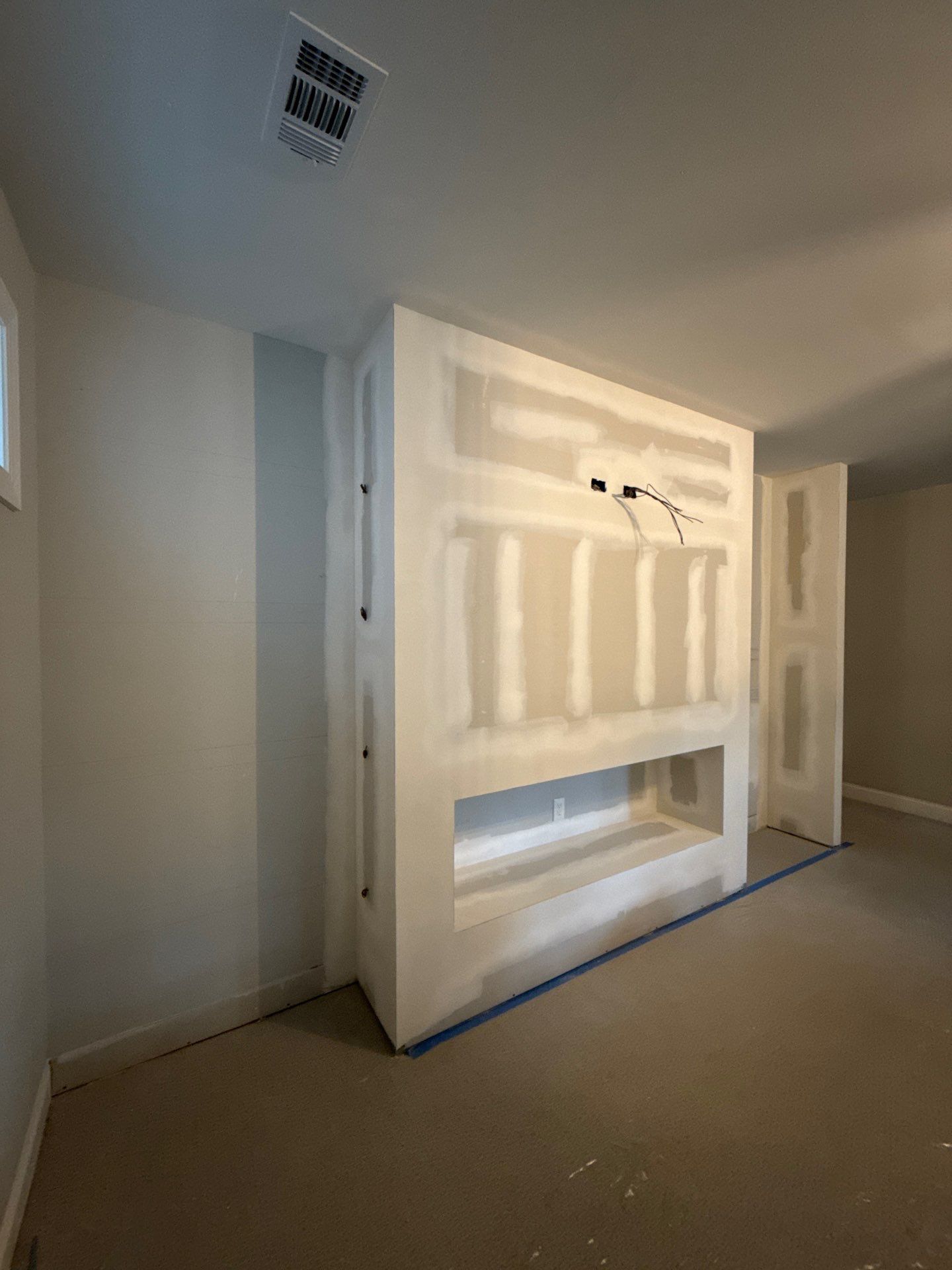 Custom Media Wall and Electric Fireplace Installation in Canton by Swift Home Renovations