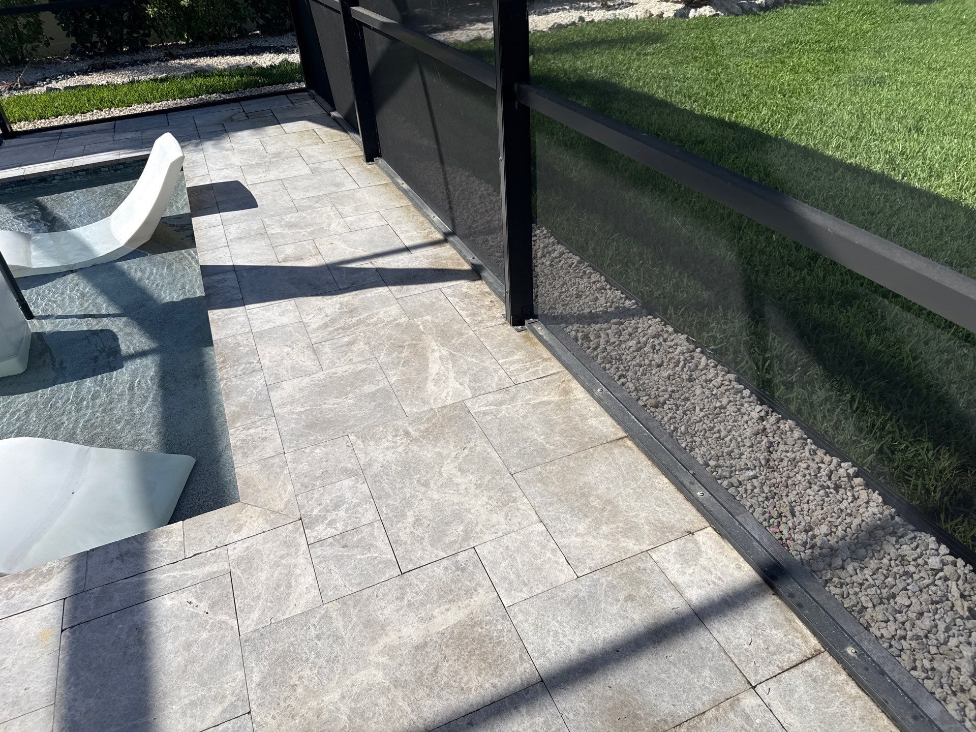 Travertine Pool Deck, Lanai & Screen Enclosure Cleaning Near Manatee River | Bradenton, FL by Sunshine AquaWash