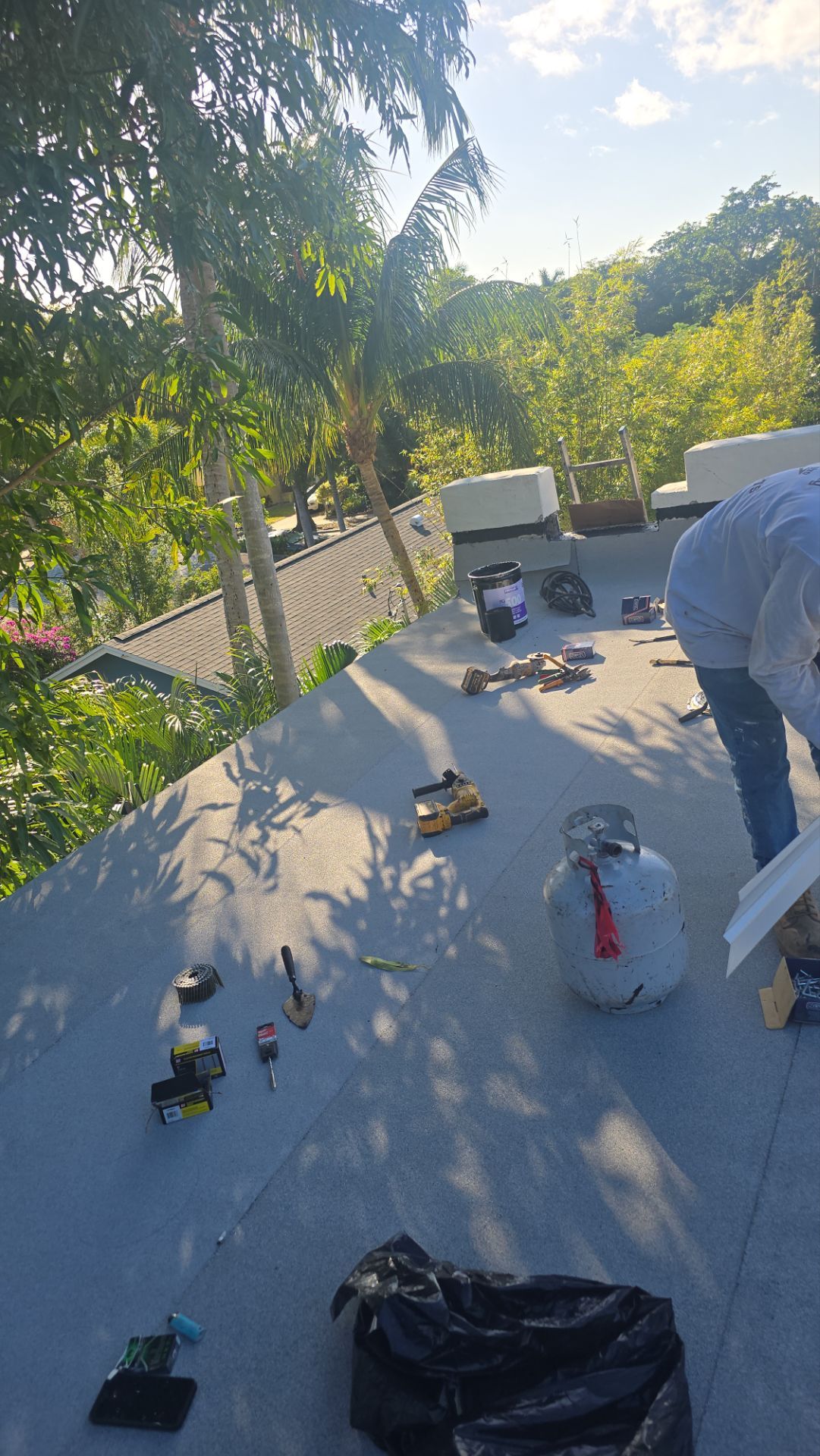 West Palm Beach Roof Restoration and Travertine Paver Driveway Installation by Aastro Roofing