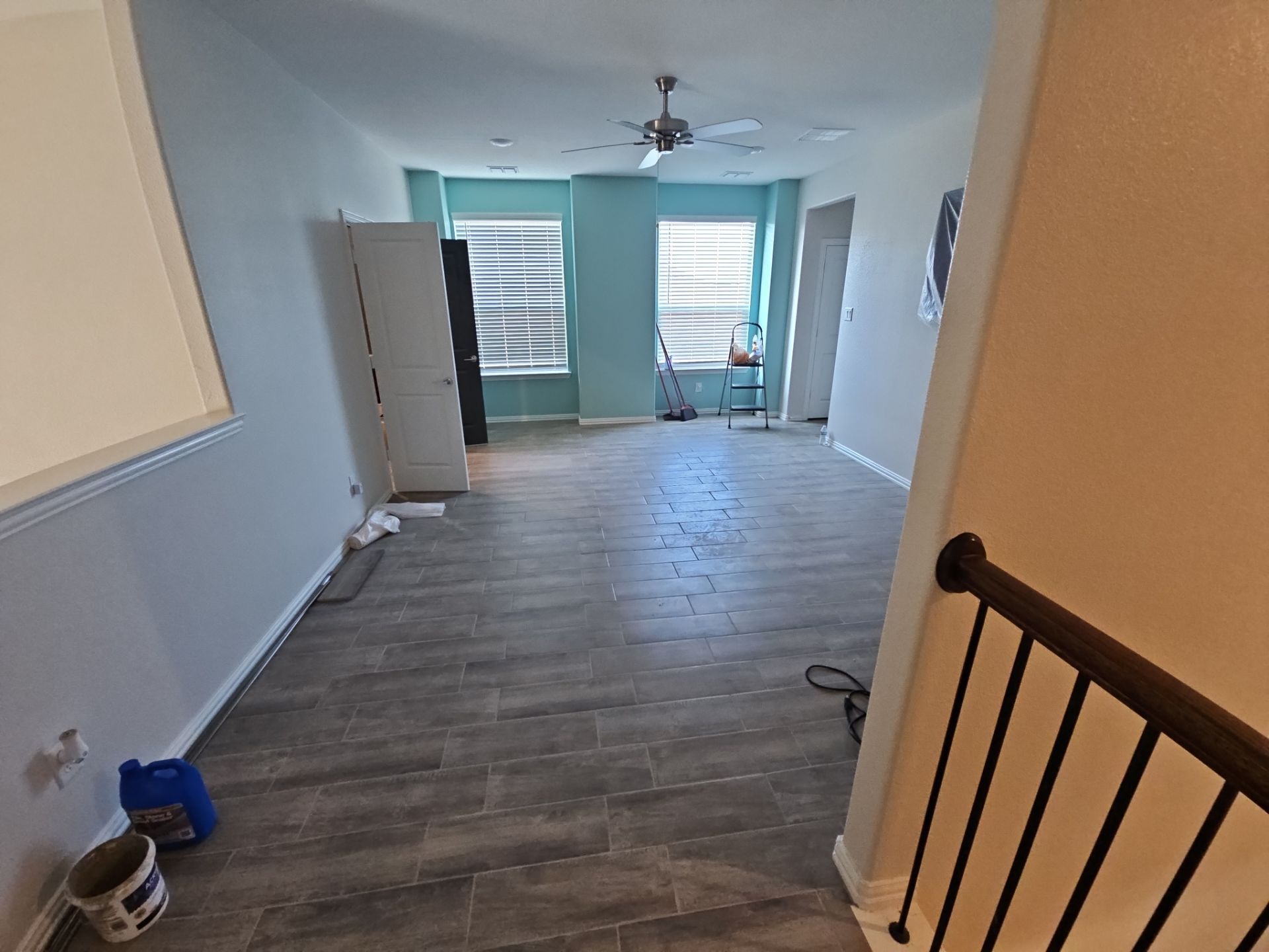 Carpet replacement with Tile and Red Oak Stairs by EL-GC LLC 