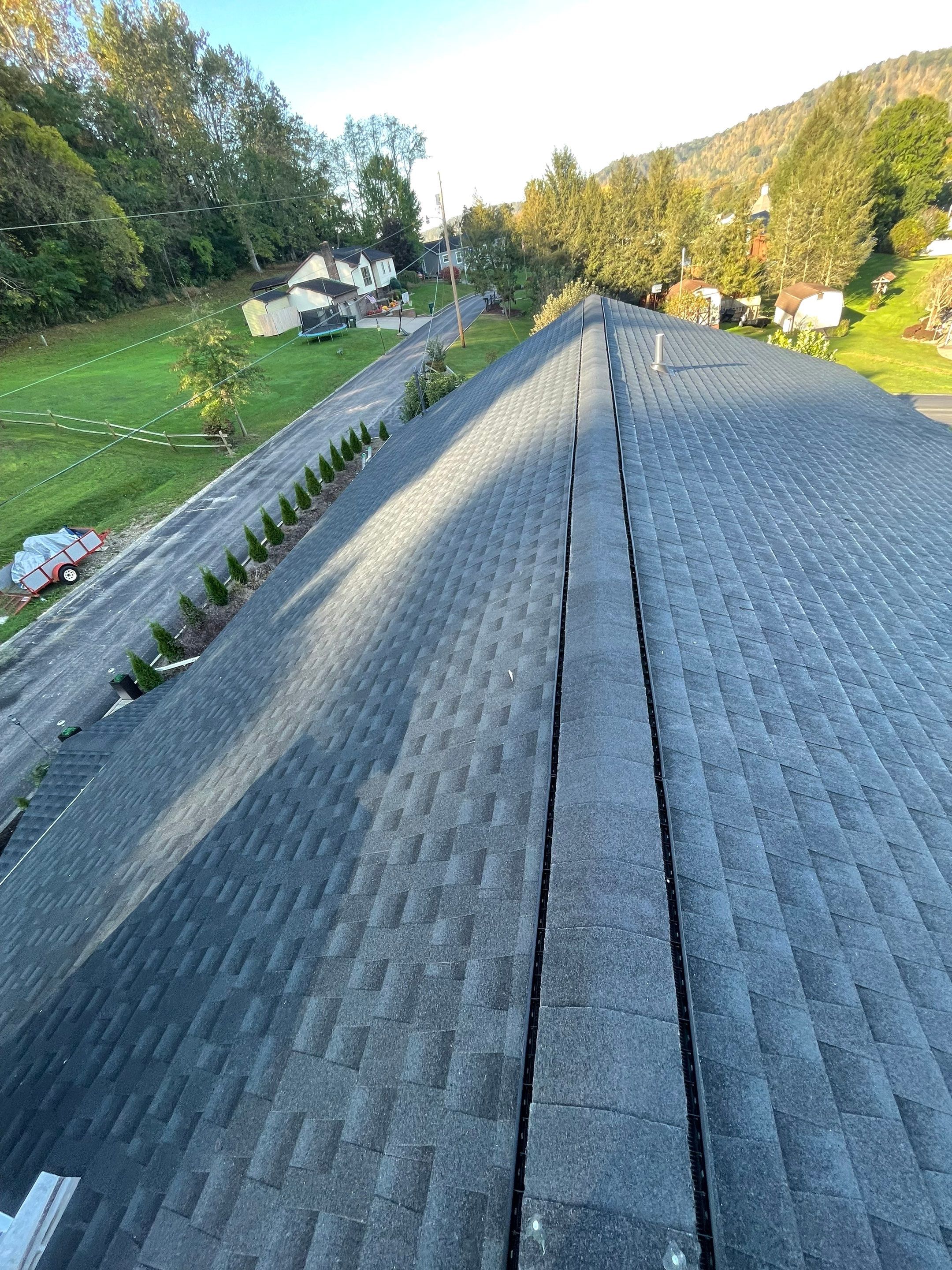 Residential Roofing Installation using GAF Timberline HDZ, Black by Rainstoppers Roofing