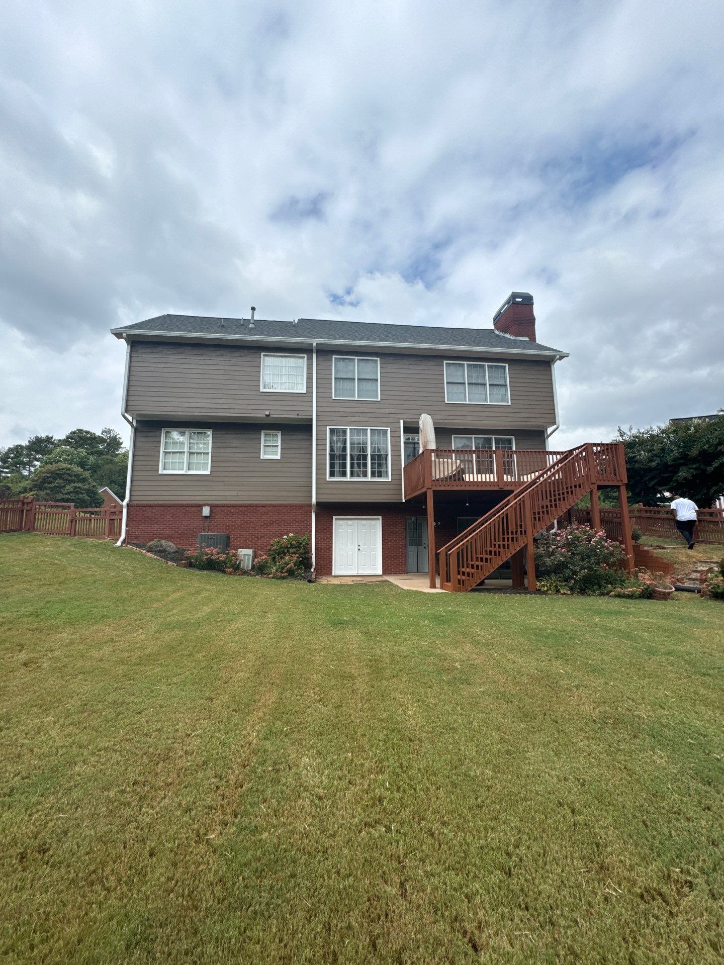 Exterior Painting and Gutter Replacement in Powder Springs by Swift Home Renovations