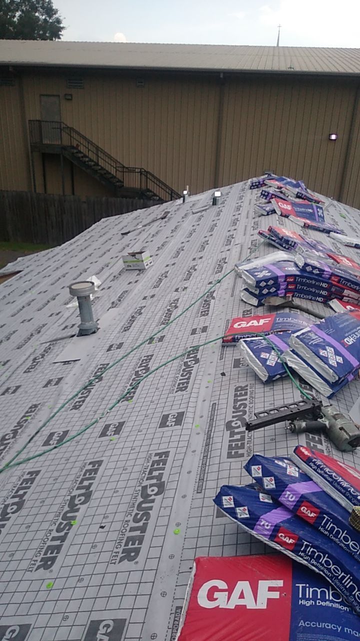 Residential Roofing Installation using Roof Replacement by American Roofing & Construction LLC