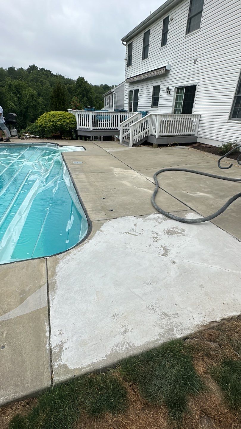 Pool Deck + Driveway + Garage Project in Venetia by Floors in a Day, Inc