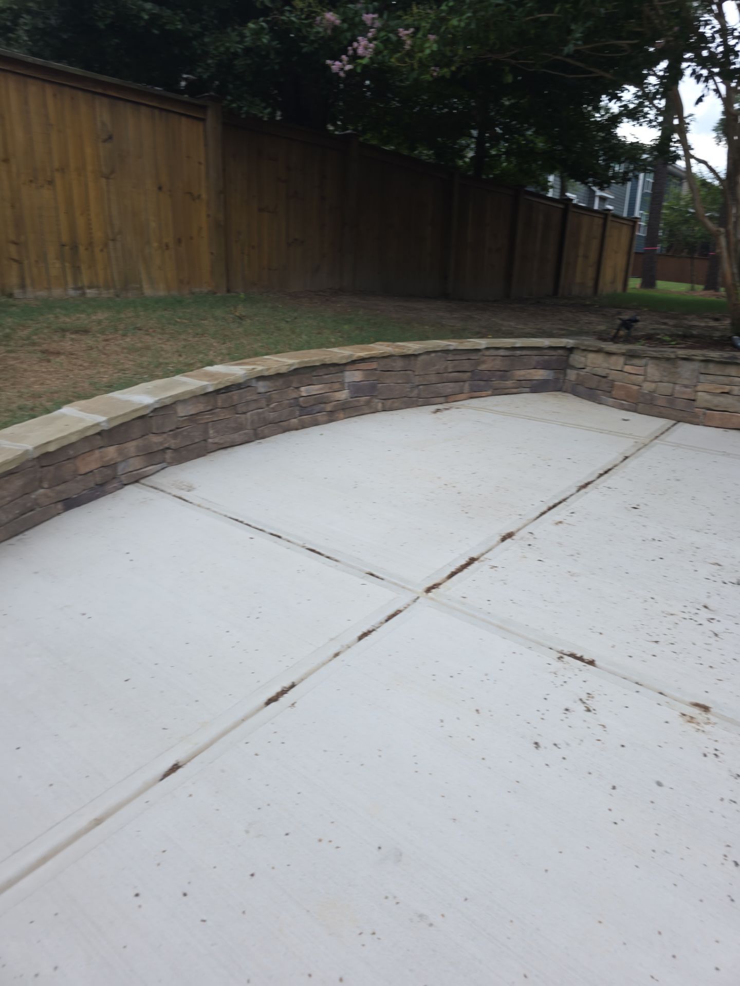 Concrete Driveway Expansion & Retaining Wall | Apex, NC by Elite Remodeling and Design LLC