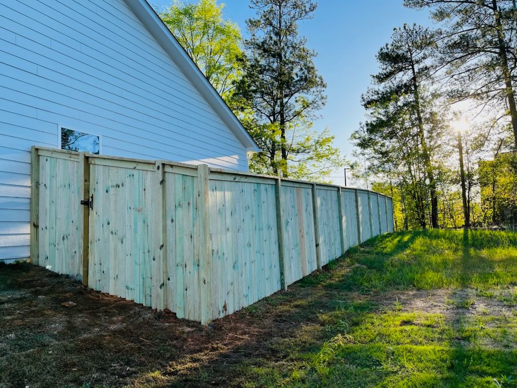 Wood Privacy with Decorative Top Cap by Titans of Timber Fence & Stain