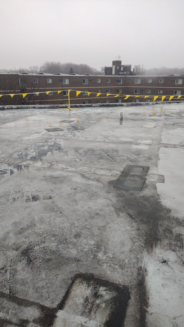 Commercial flat roof parma by Absolute Roofing and Construction