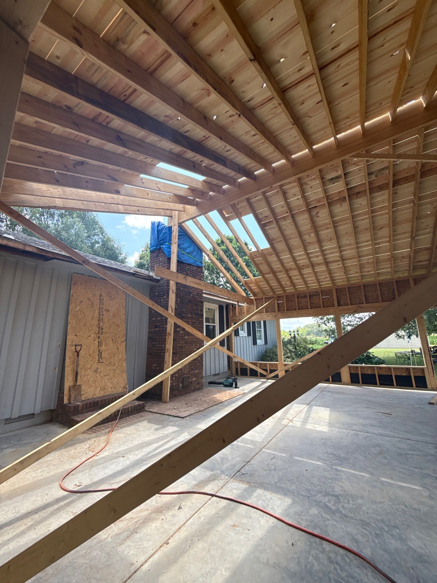 Sunroom and Garage Addition by Skilled Construction LLC