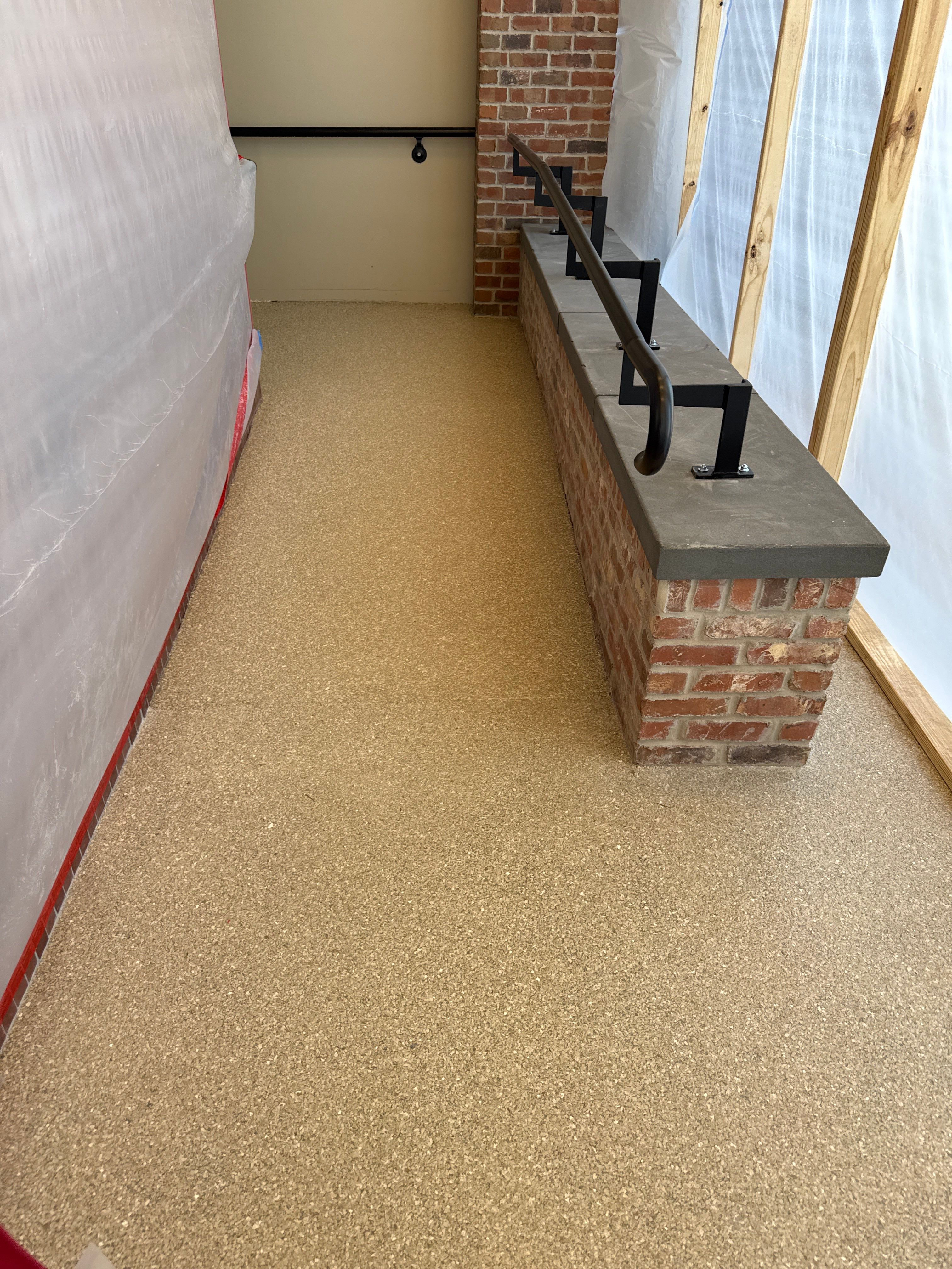 Industrial Epoxy Flake and Concrete Overlay Floor Installation in Pensacola by Cornerstone Hard Surface Restoration