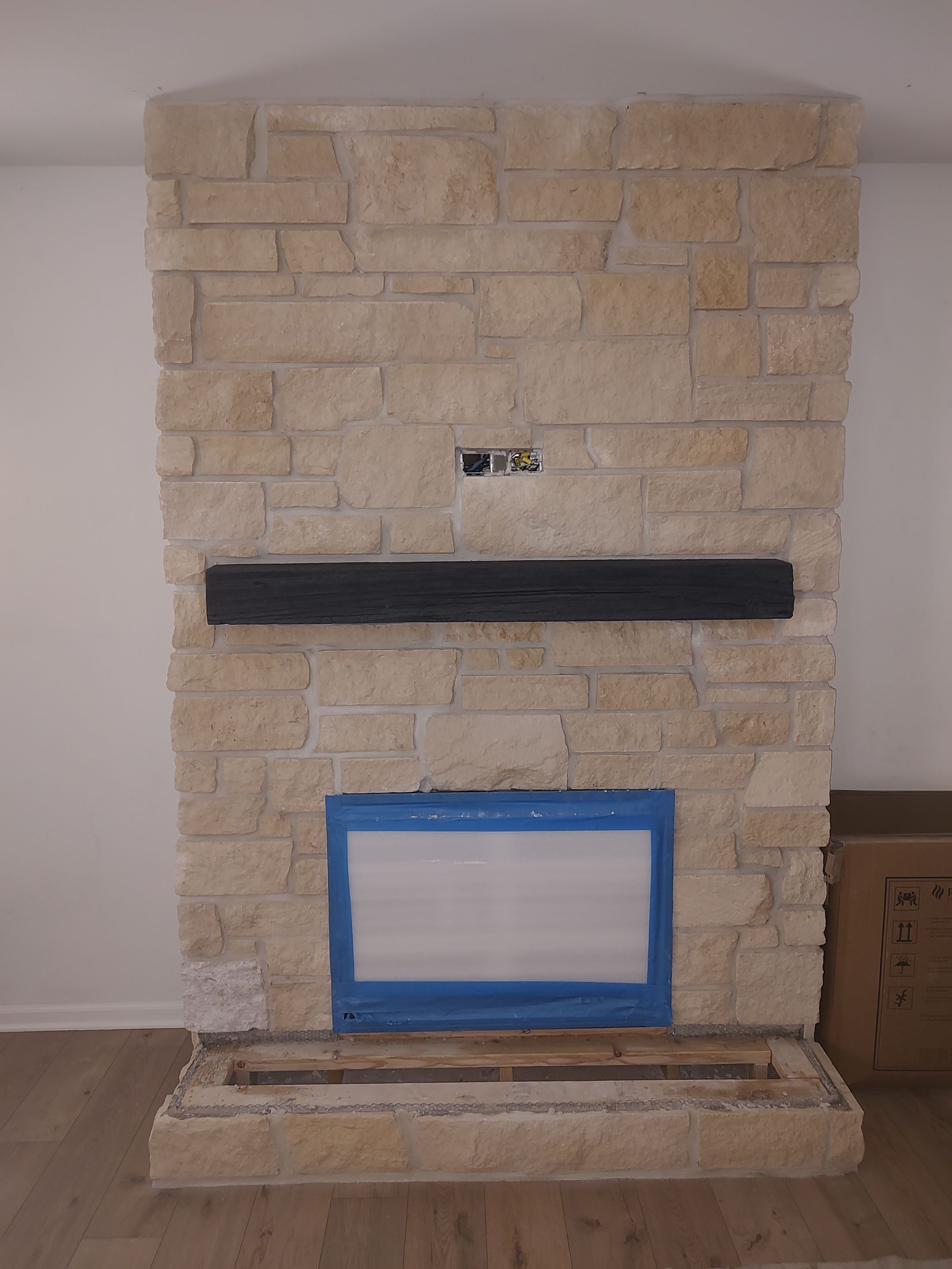 Electric Fireplace & Stone Veneer Installation by Leonard and Sons Building Services, Inc.
