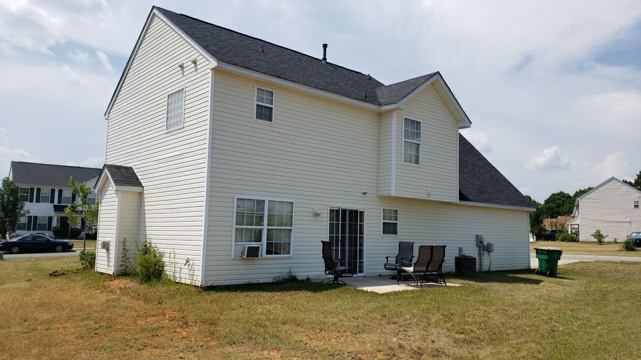 House Wash using cleaner by Power Wash Masters LLC