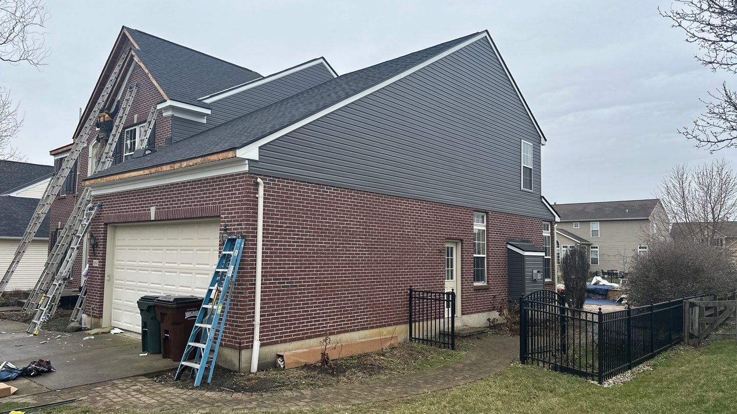 Roofing & Siding  by Tamlin Roofing