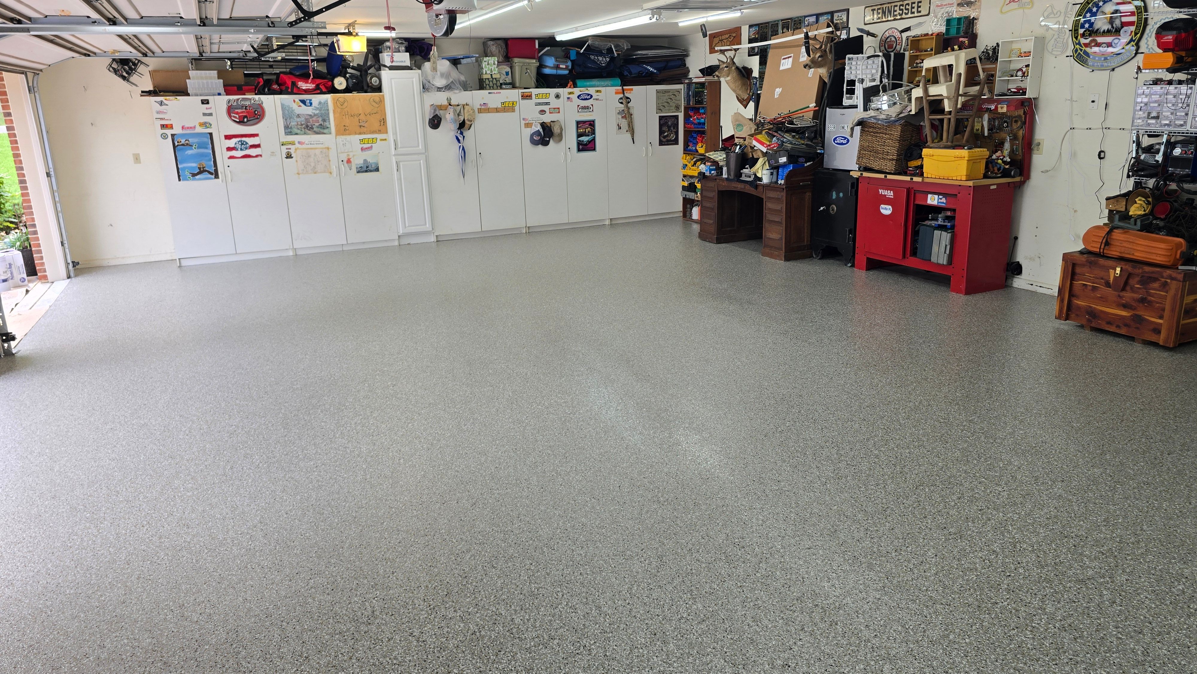 Driveway, Garage, Porch, and Sidewalk using Creekbed by Elite Floor Solutions