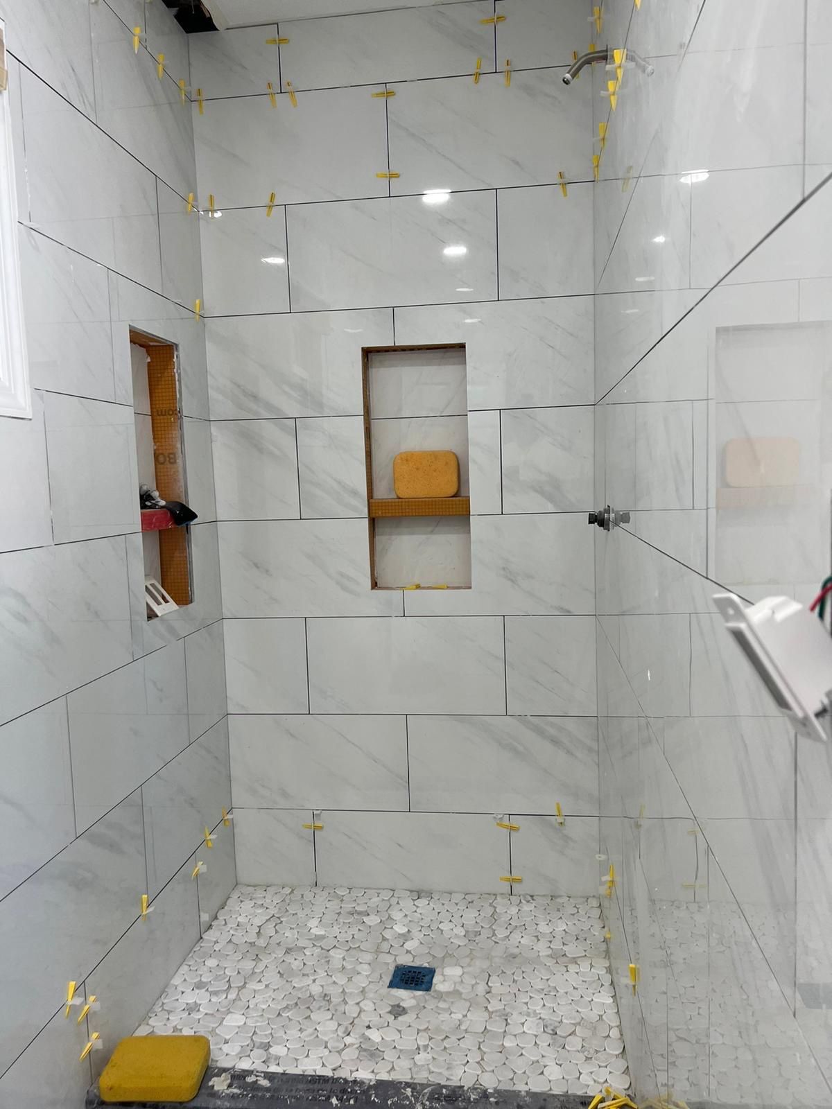 Bathroom Remodel using Tile by Home Concepts Construction