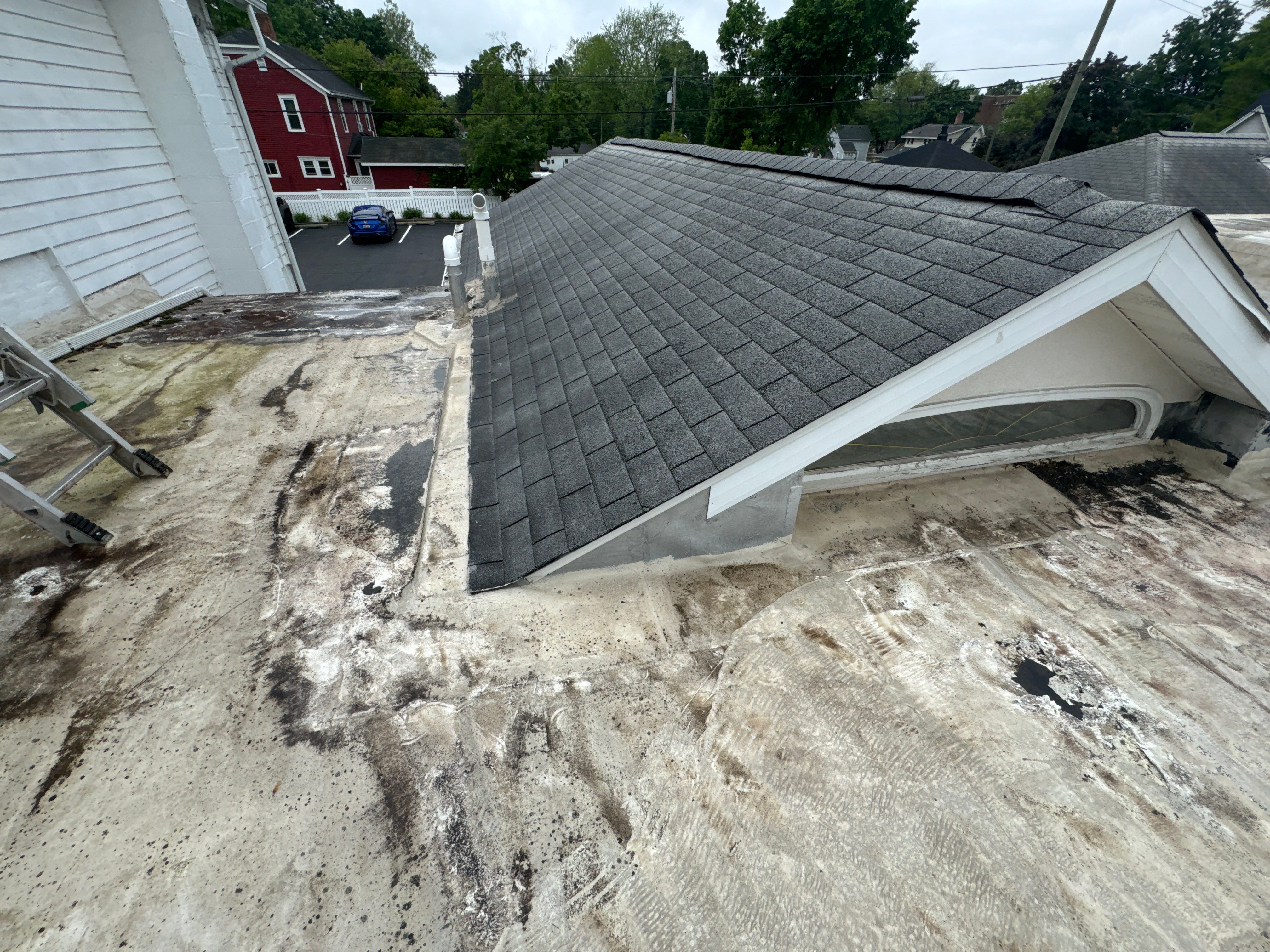 Commercial Flat and Shingled Roof Project by 42 North Construction, LLC.