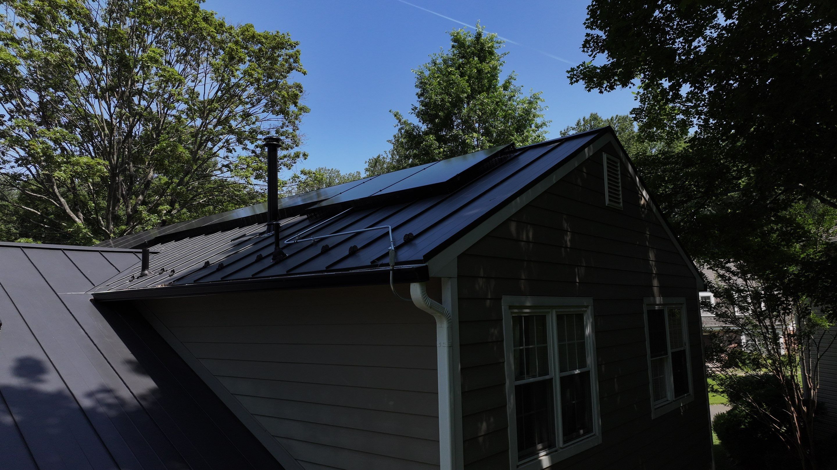 Metal Roof + REC Panels: A Solar Upgrade by American Home Contractors