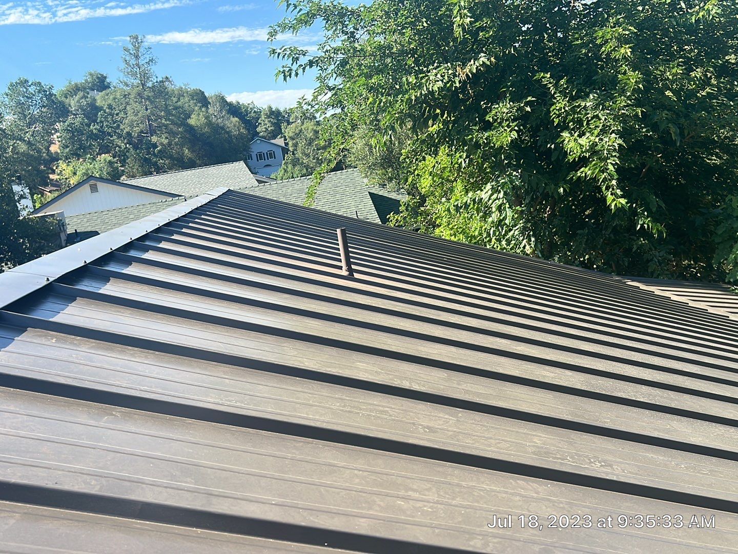 Metal roofing installation using ASC Standing Seam metal by Straight Edge Roofing Inc