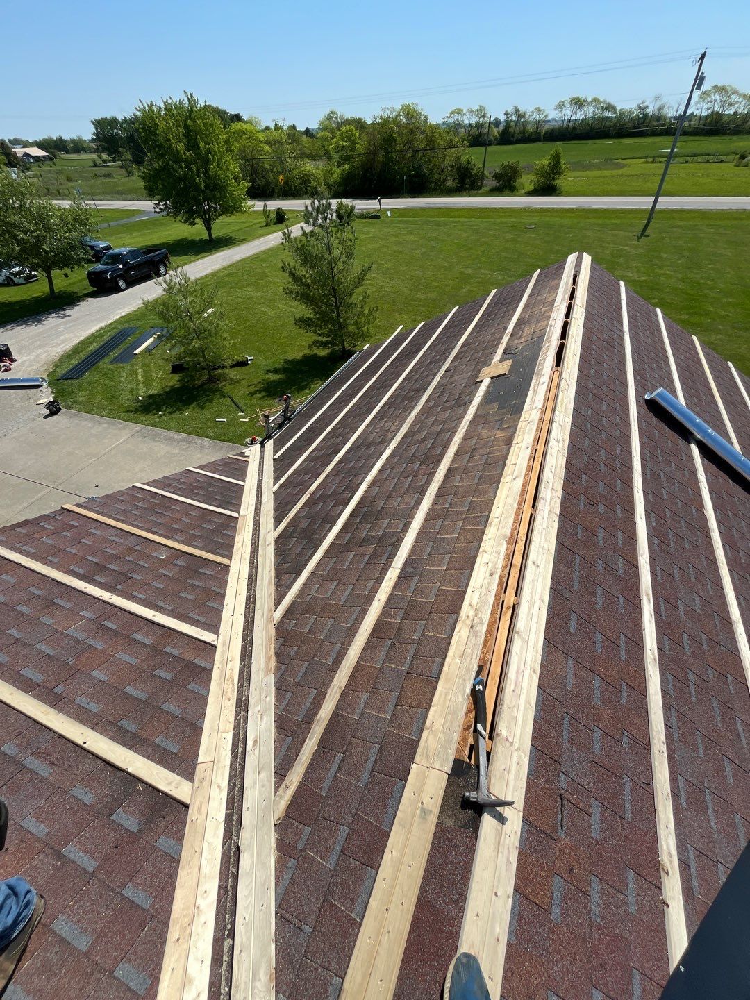 Residential Roofing Installation using Perfromance Panel Metal - Black by RoofX 