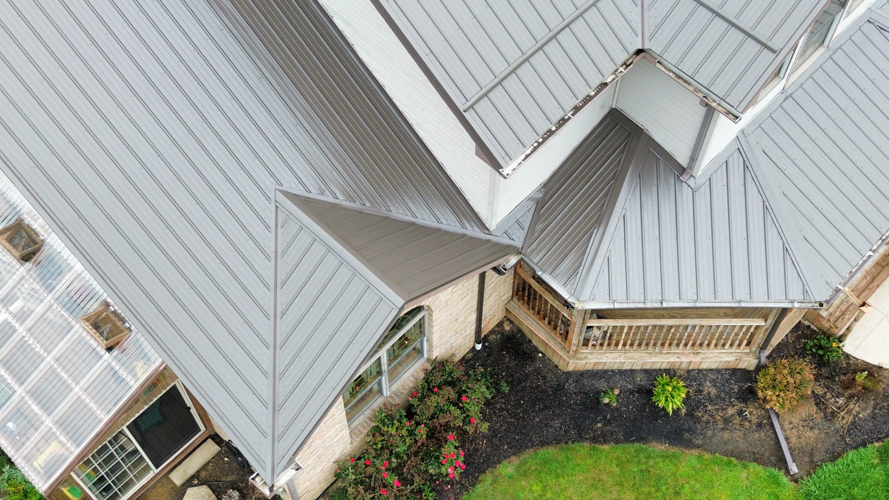 Residential Roofing Installation using Performance Panel Metal - Burnished Slate by RoofX 