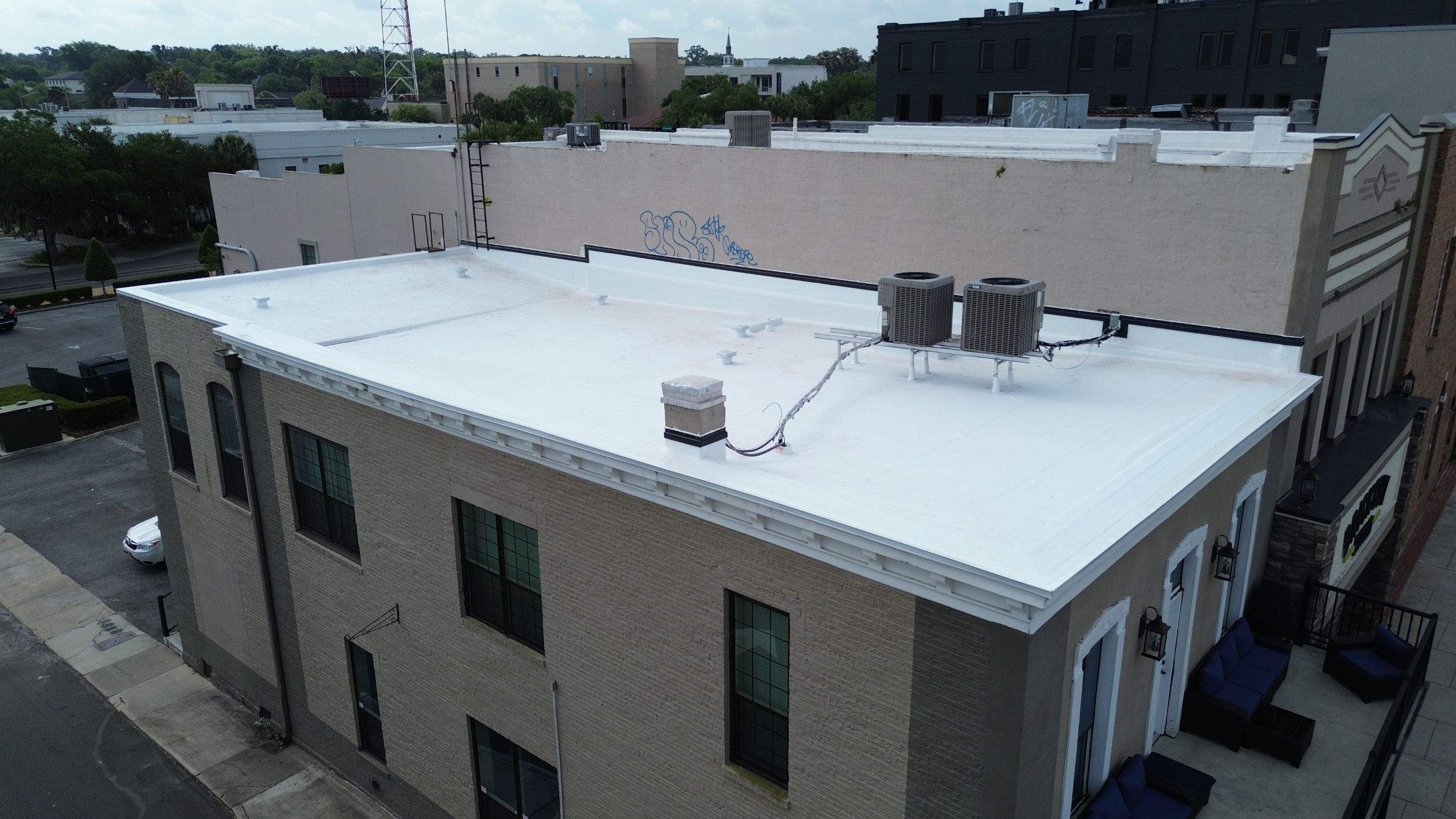 Flat Commercial TPO Reroof in Downtown Ocala, FL by Brehm Roofing
