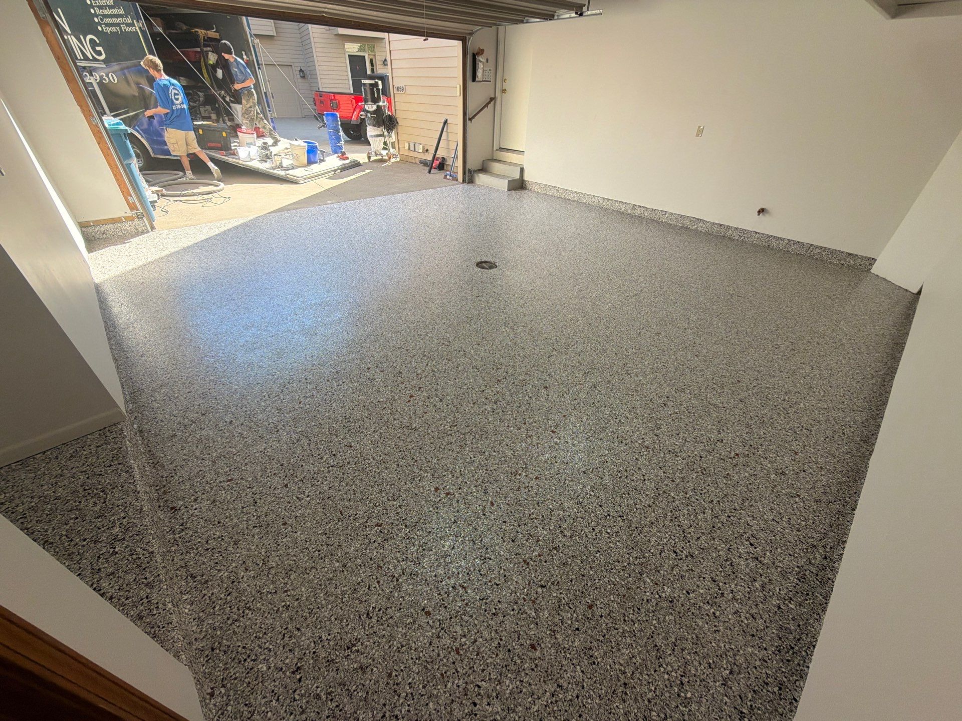 Custom Epoxy Flake Floor Coating and Ceiling Repair in Muskegon by Gordon Painting