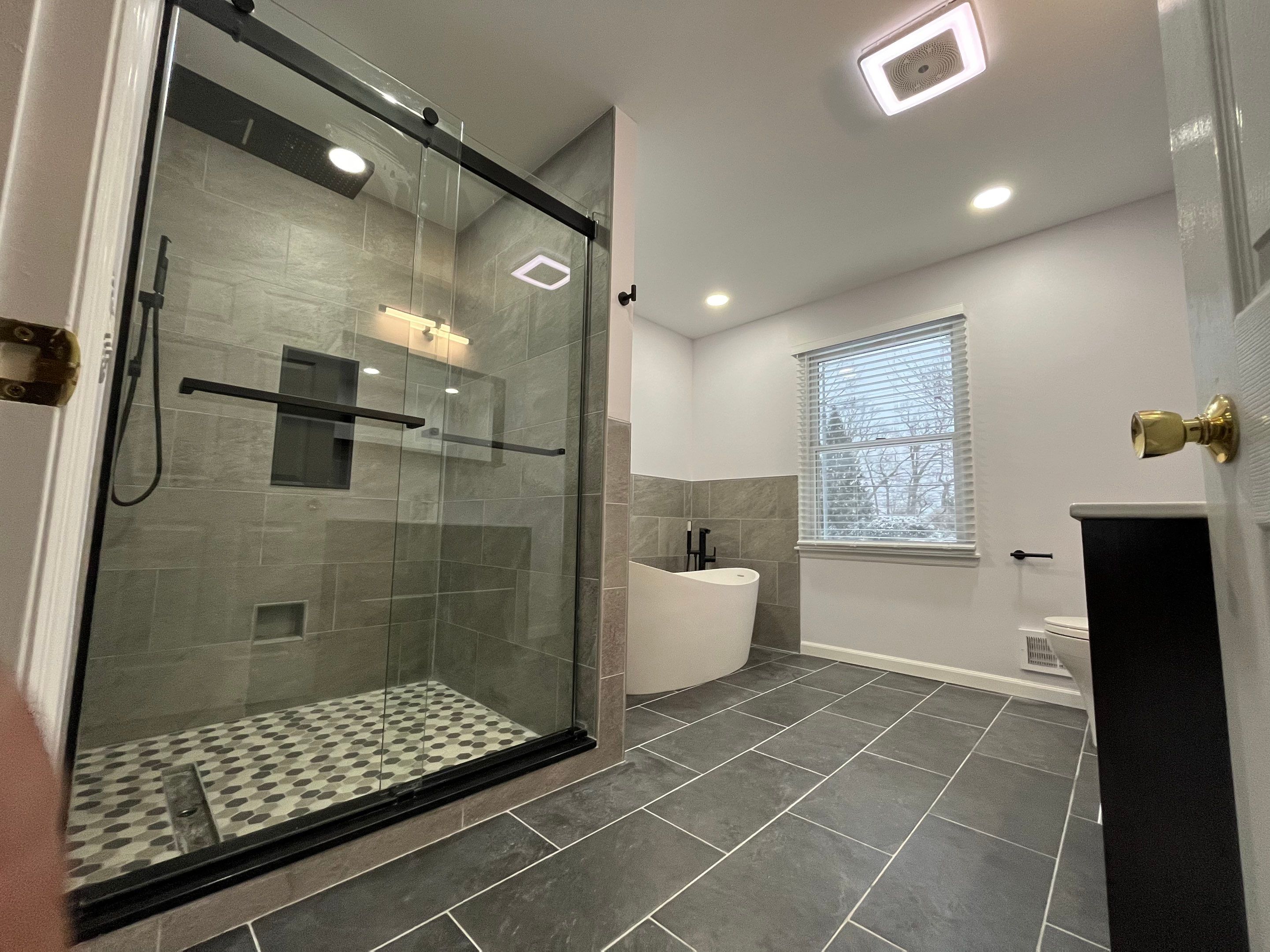 Bathroom Remodel using Tile by Home Concepts Construction