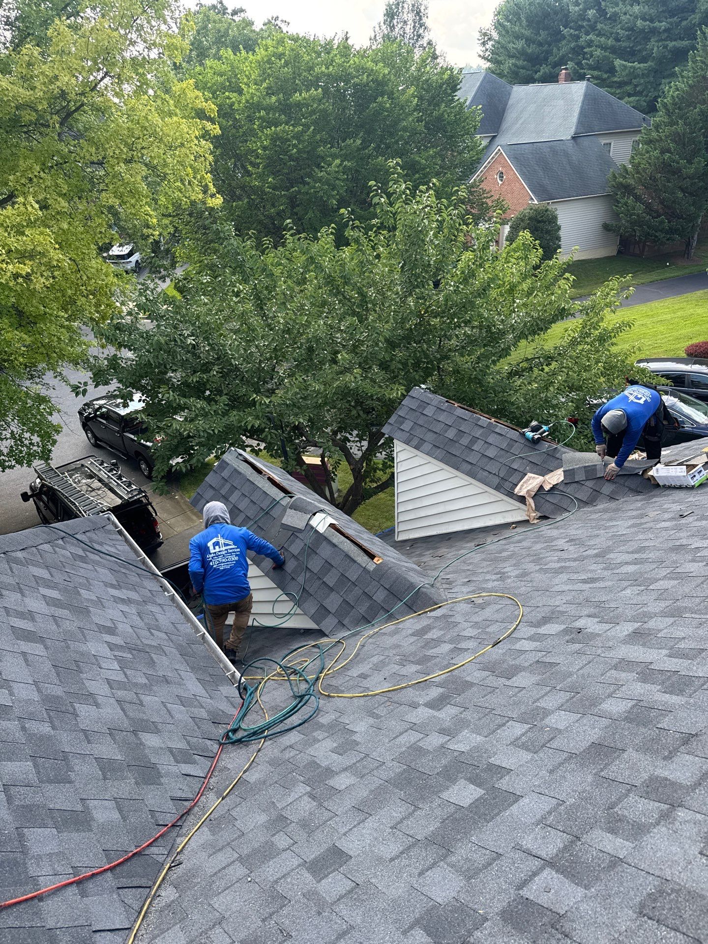 New Shingle Roof & New Gutters and downspouts with covers by Alpha Design Services