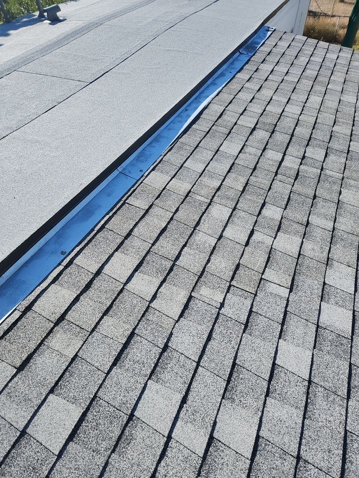 Estate Gray Shingles by Reimagine Roofing
