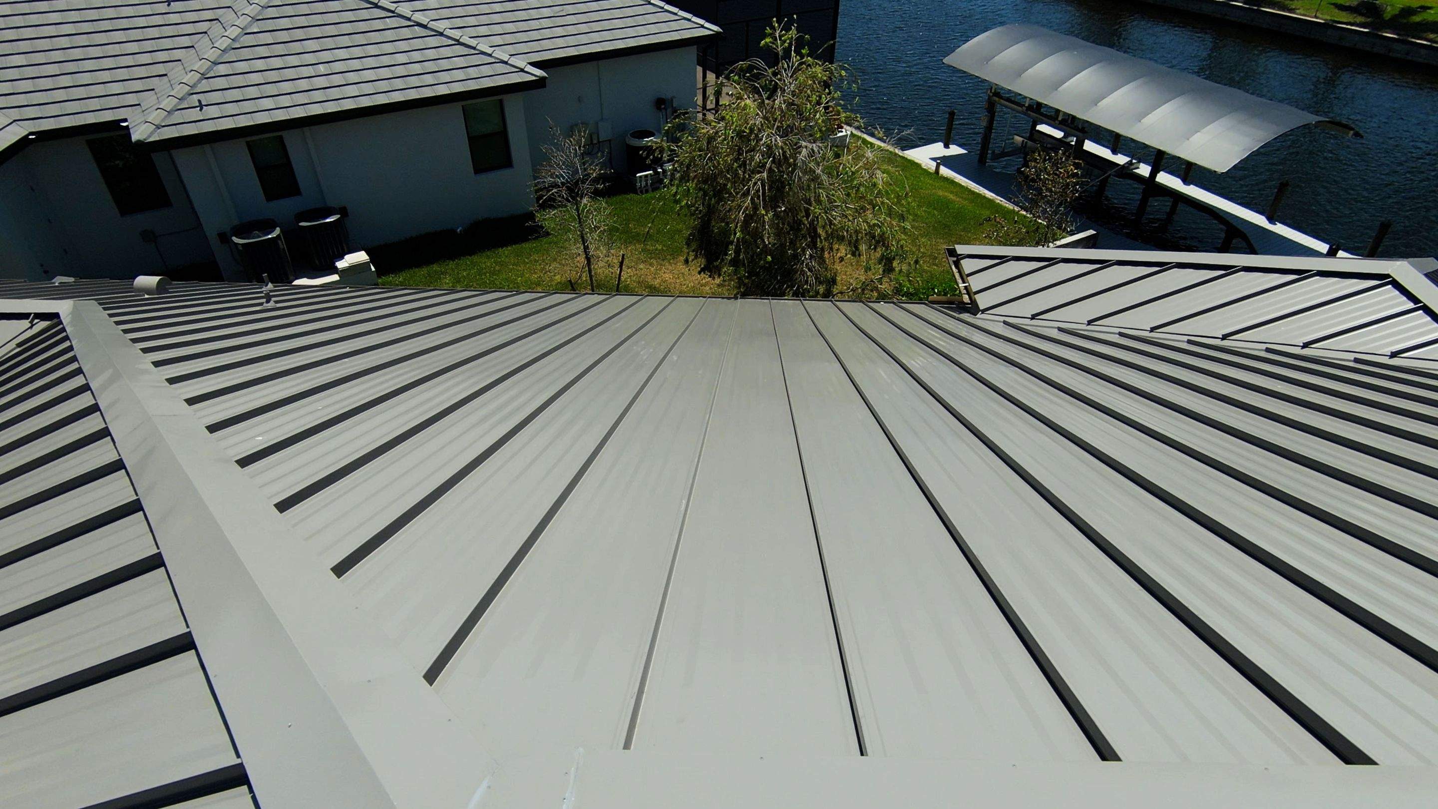 Residential Roofing Installation using Gulf Coast Metals Gulf Seam Panels by Four Peaks Roofing