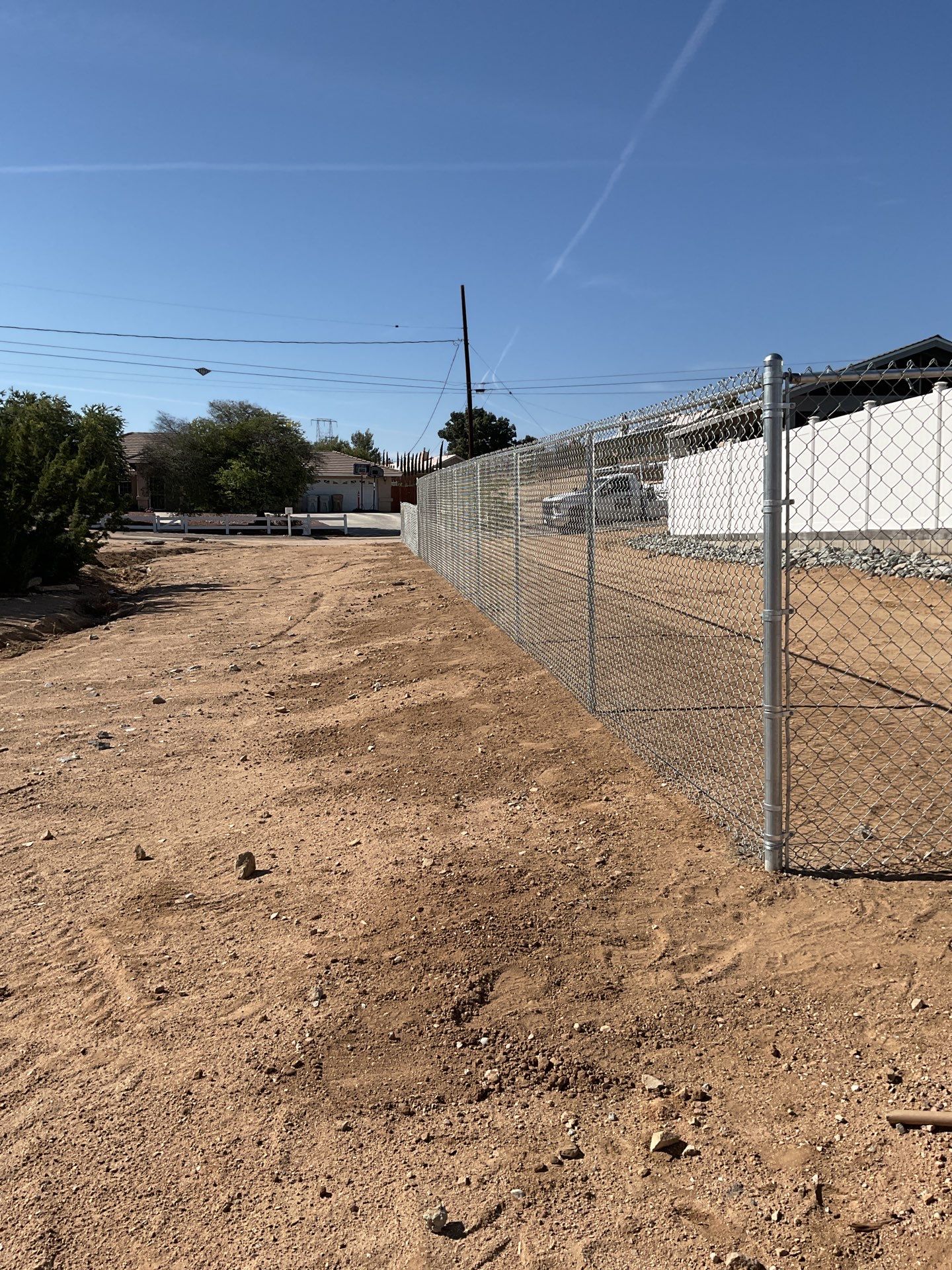 Fence Installation using chain -link by Fence Guys Inc.