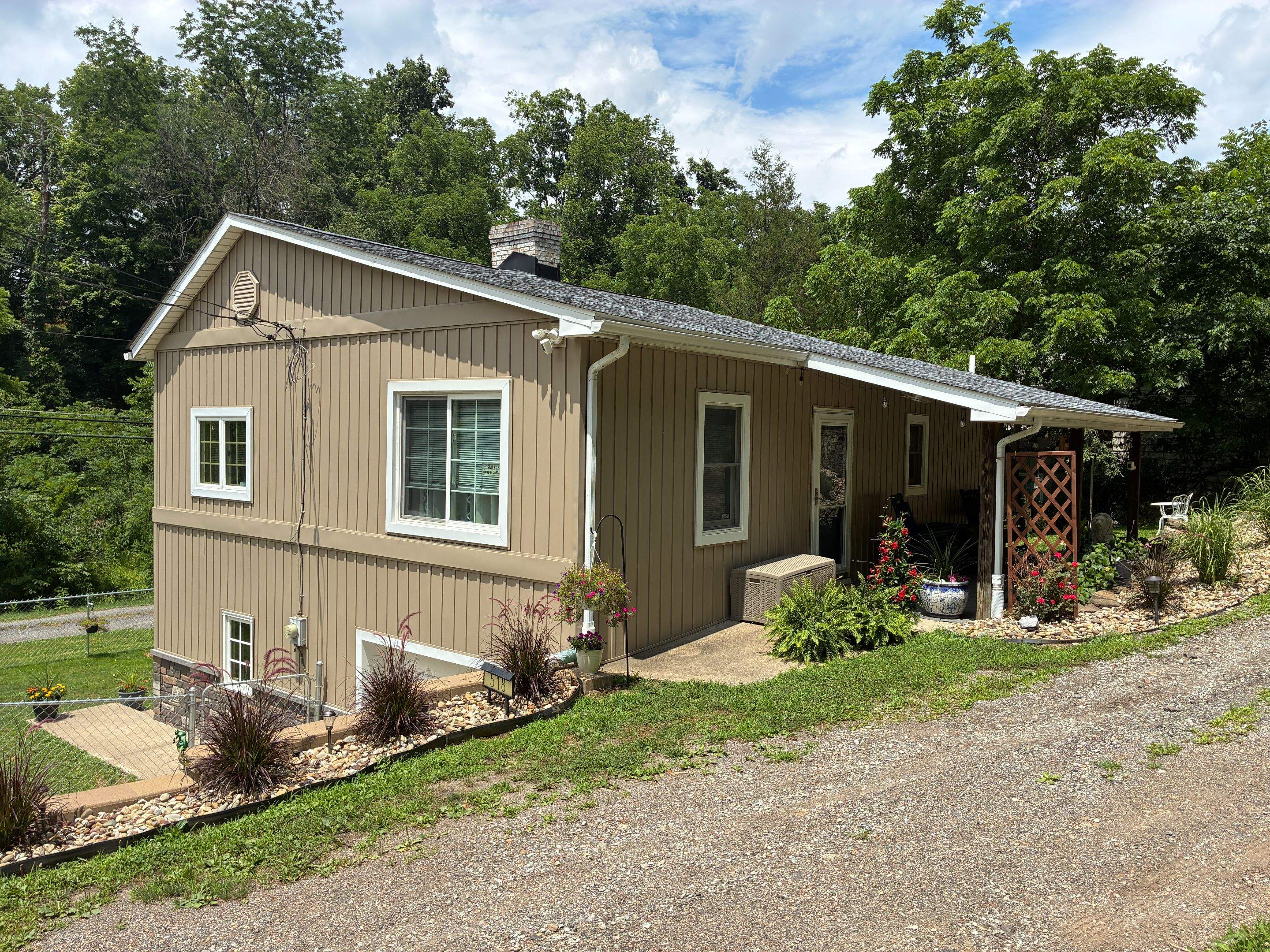 Jefferson Hills Vertical Board and Batten Siding and TandoStone Renovation by Ideal Siding Pittsburgh