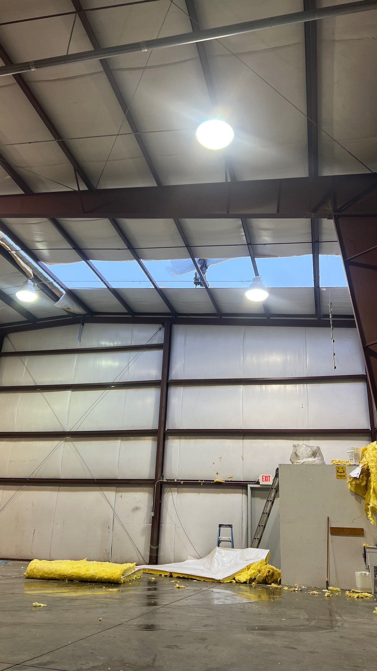 Airport Hanger Metal Roof Replacement and Insulation by Villegas Remodeling, LLC