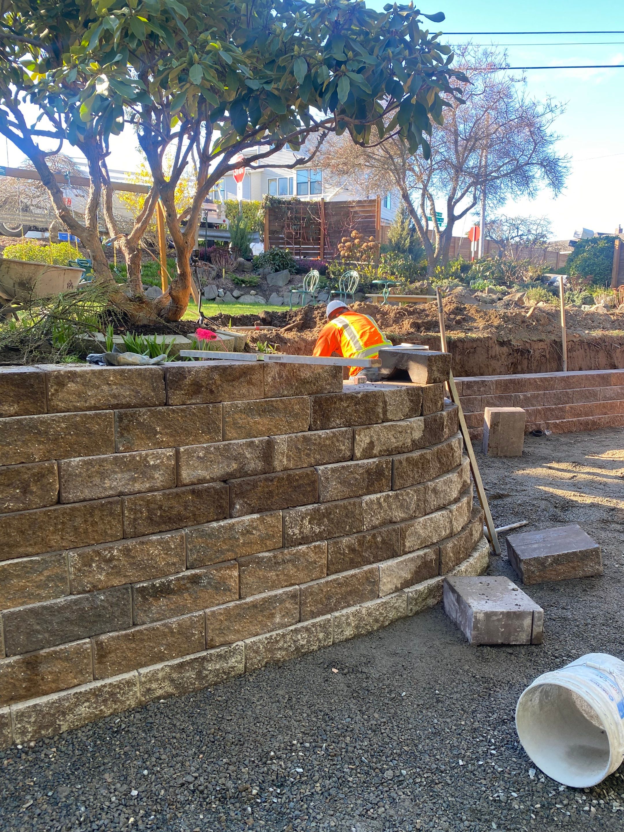 Lorra | Asphalt Driveway Repair & Retaining Wall by Jireh Asphalt & Concrete Inc 