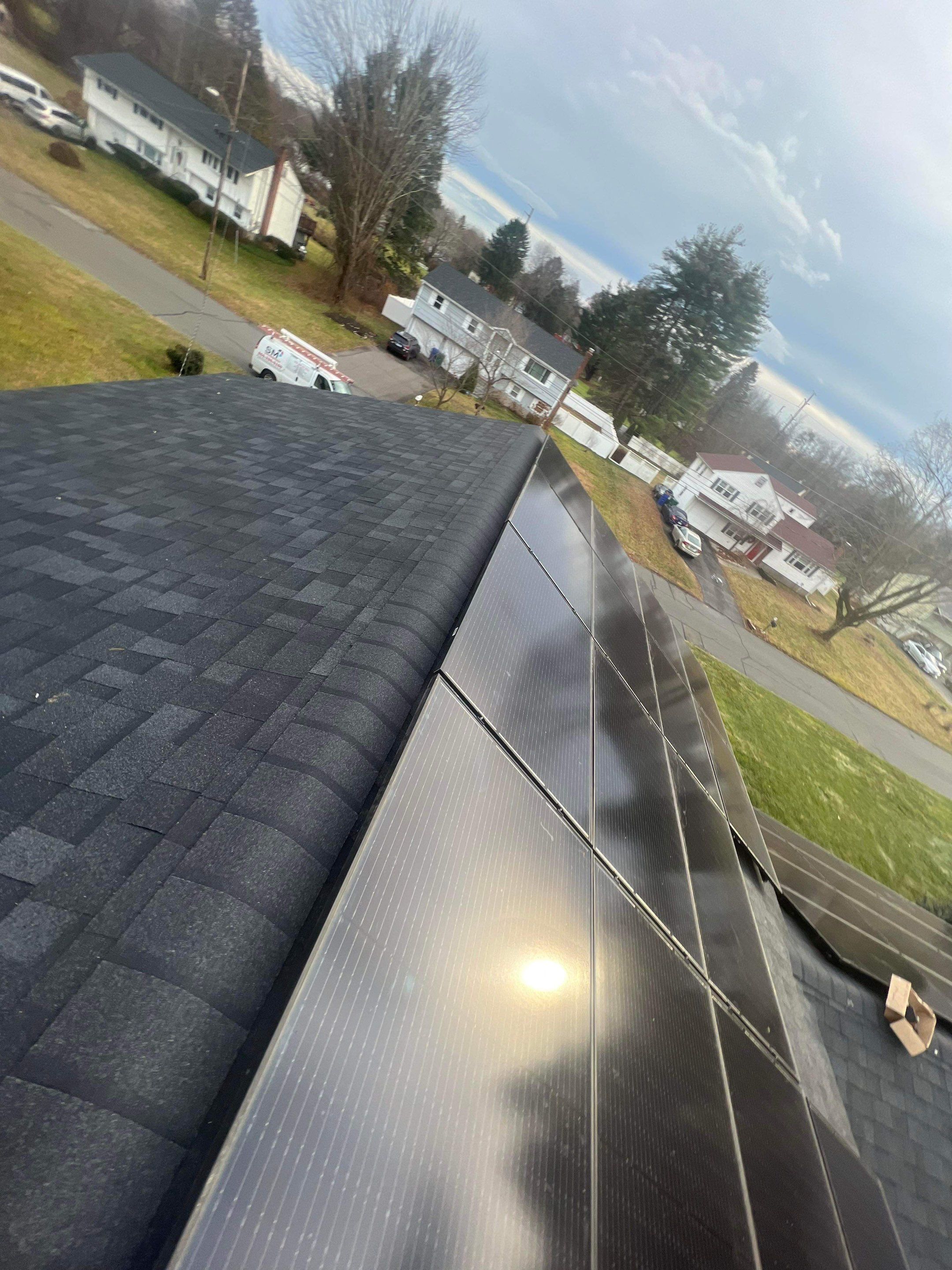 Onyx Black Shingles by Reimagine Roofing