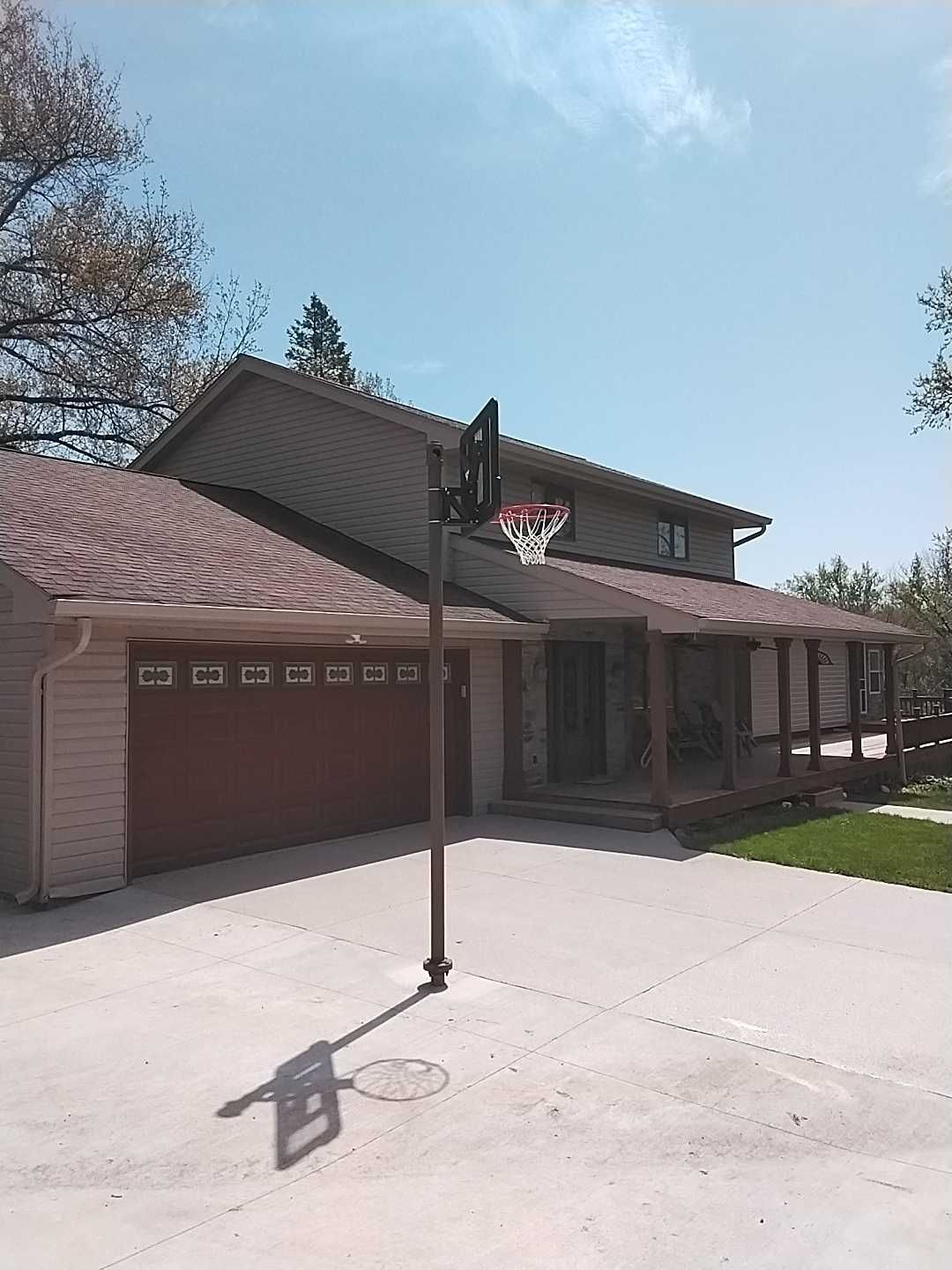 Residential Exterior Repaint Including Shop and Shed  by Midwest Paint LLC